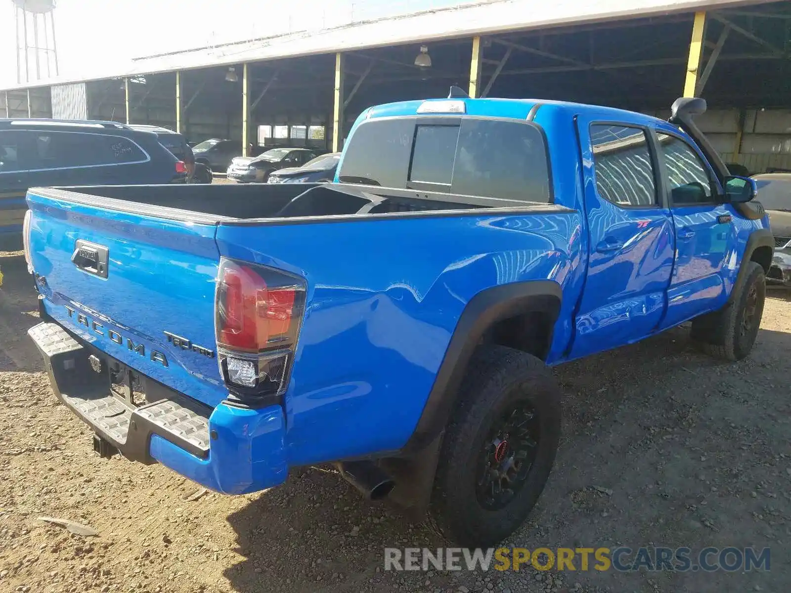 4 Photograph of a damaged car 5TFCZ5AN4KX169944 TOYOTA TACOMA 2019