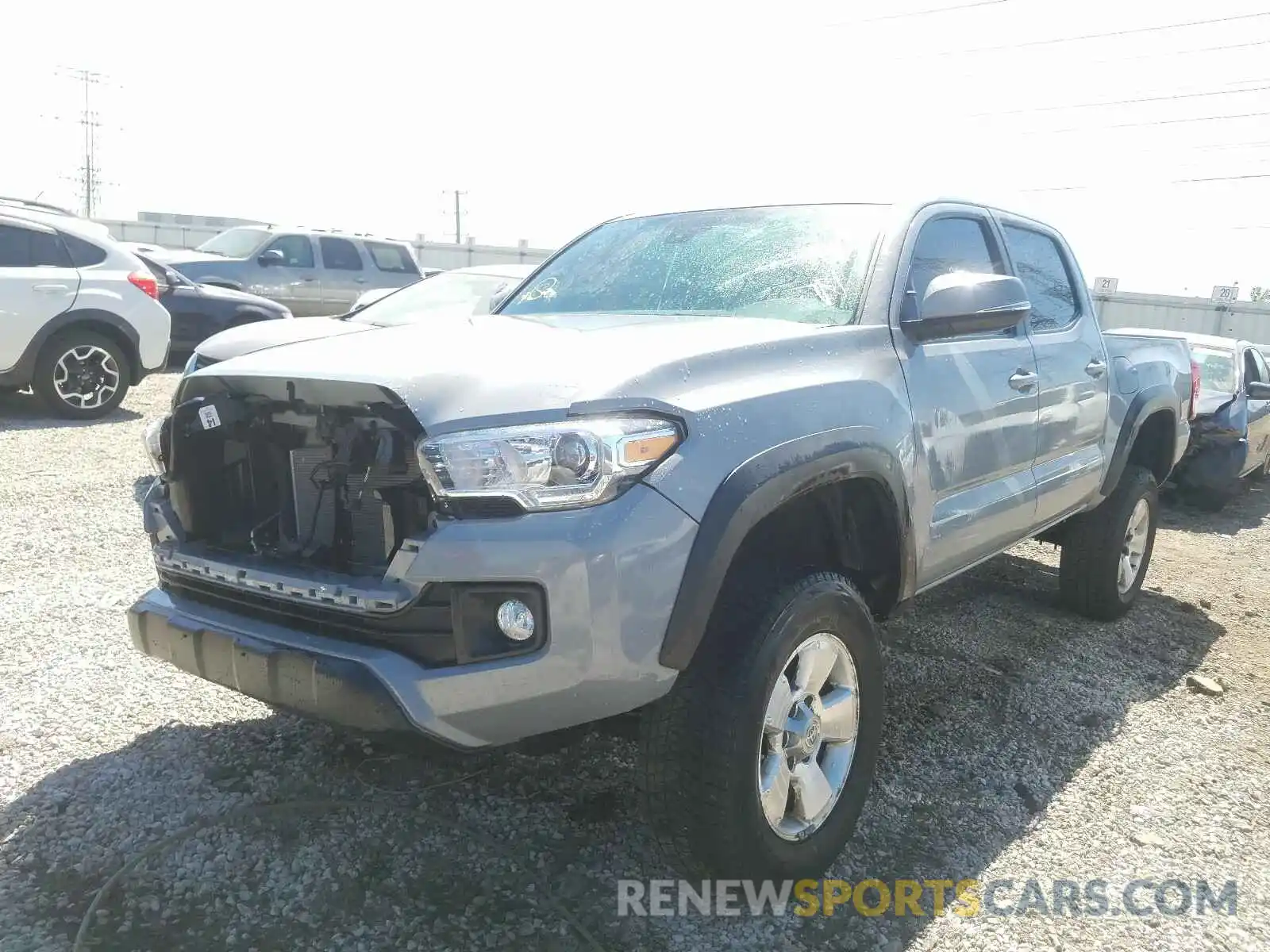 2 Photograph of a damaged car 5TFCZ5AN4KX170124 TOYOTA TACOMA 2019