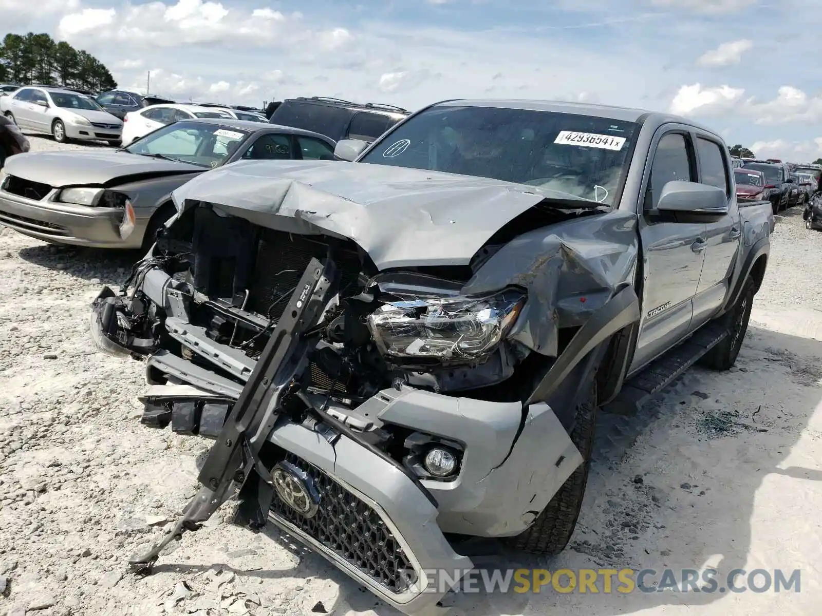 2 Photograph of a damaged car 5TFCZ5AN4KX171726 TOYOTA TACOMA 2019