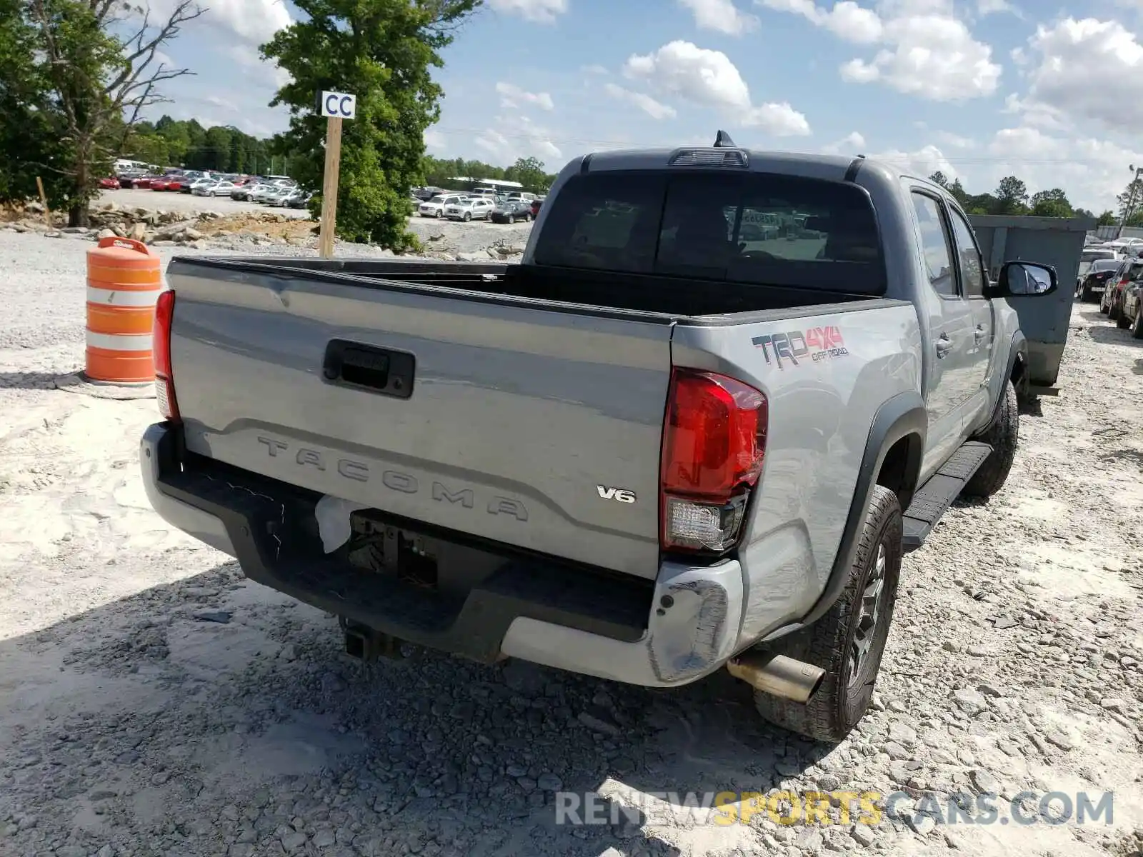 4 Photograph of a damaged car 5TFCZ5AN4KX171726 TOYOTA TACOMA 2019