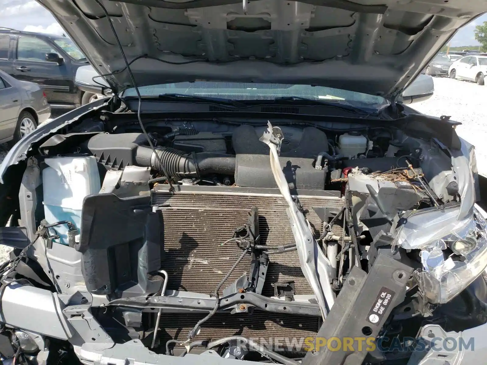 7 Photograph of a damaged car 5TFCZ5AN4KX171726 TOYOTA TACOMA 2019