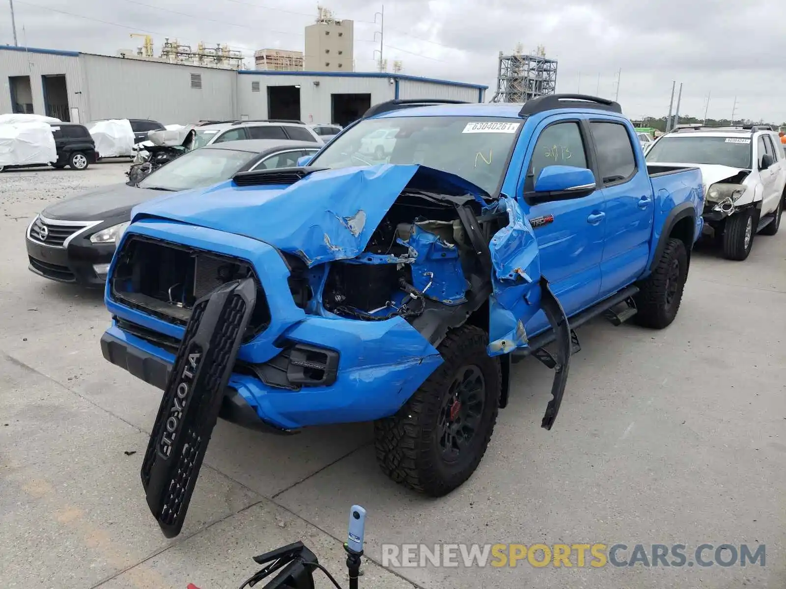 2 Photograph of a damaged car 5TFCZ5AN4KX173475 TOYOTA TACOMA 2019