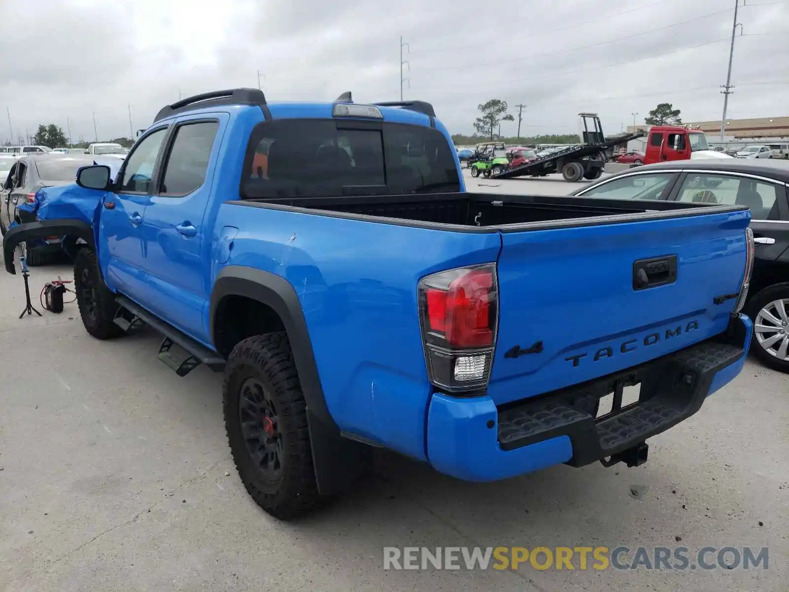 3 Photograph of a damaged car 5TFCZ5AN4KX173475 TOYOTA TACOMA 2019