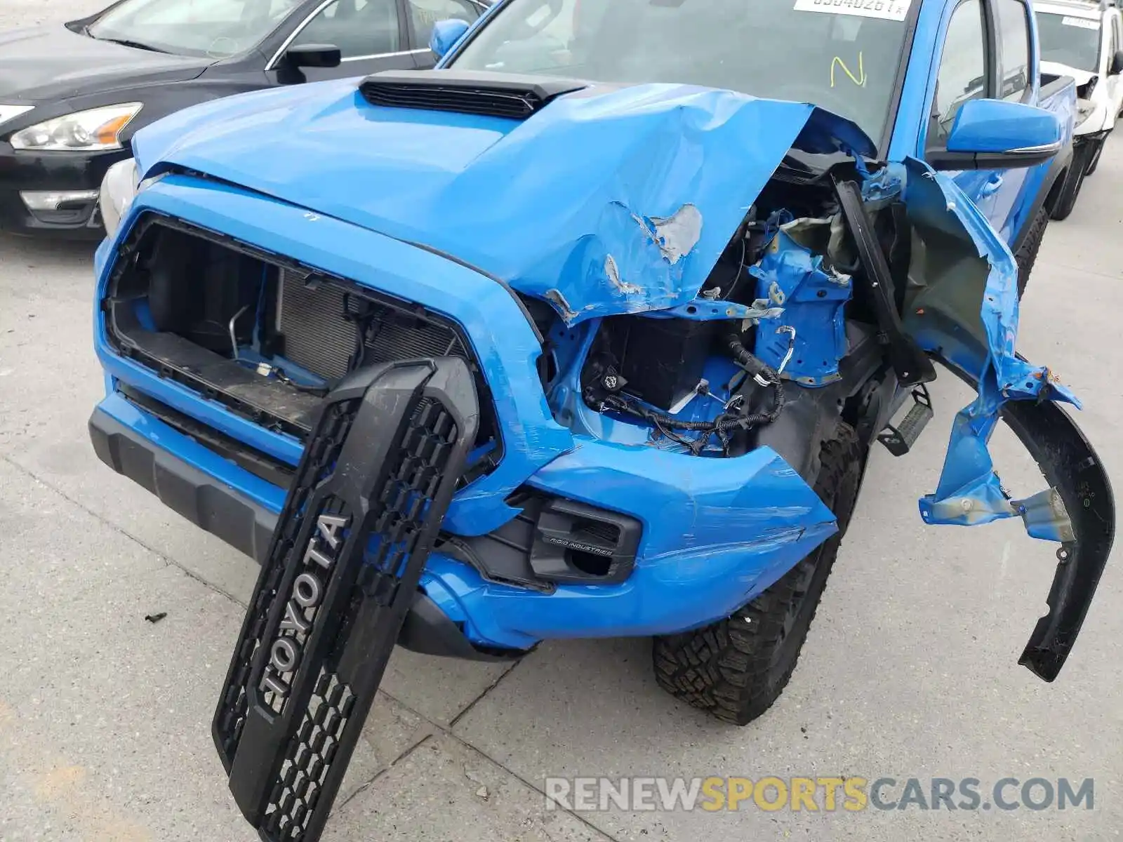 9 Photograph of a damaged car 5TFCZ5AN4KX173475 TOYOTA TACOMA 2019