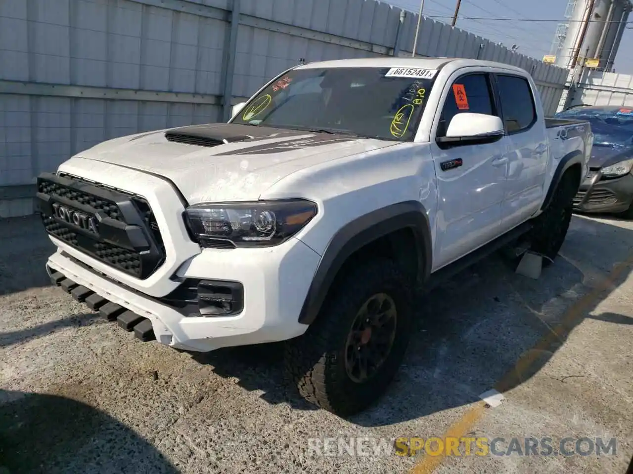 2 Photograph of a damaged car 5TFCZ5AN4KX176781 TOYOTA TACOMA 2019