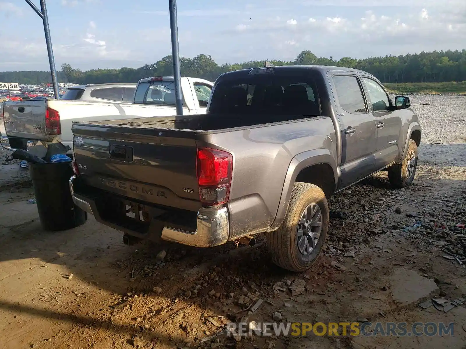 4 Photograph of a damaged car 5TFCZ5AN4KX177106 TOYOTA TACOMA 2019