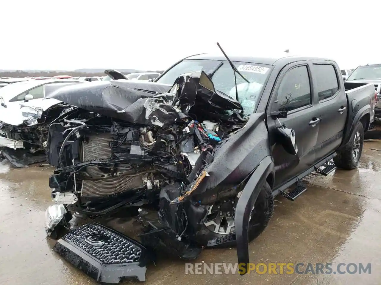 2 Photograph of a damaged car 5TFCZ5AN4KX177347 TOYOTA TACOMA 2019