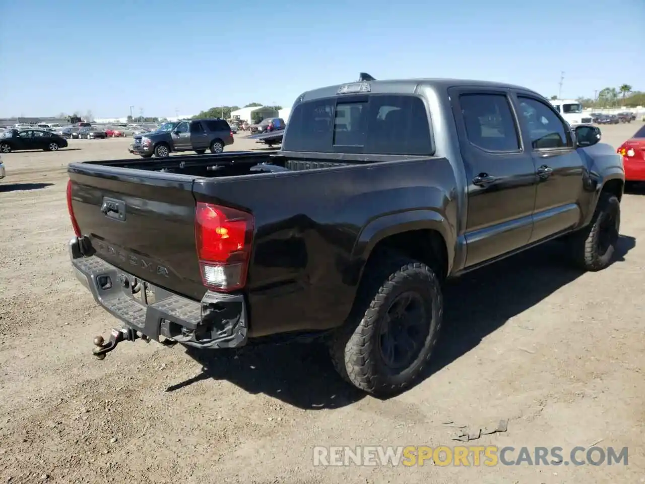 4 Photograph of a damaged car 5TFCZ5AN4KX181883 TOYOTA TACOMA 2019