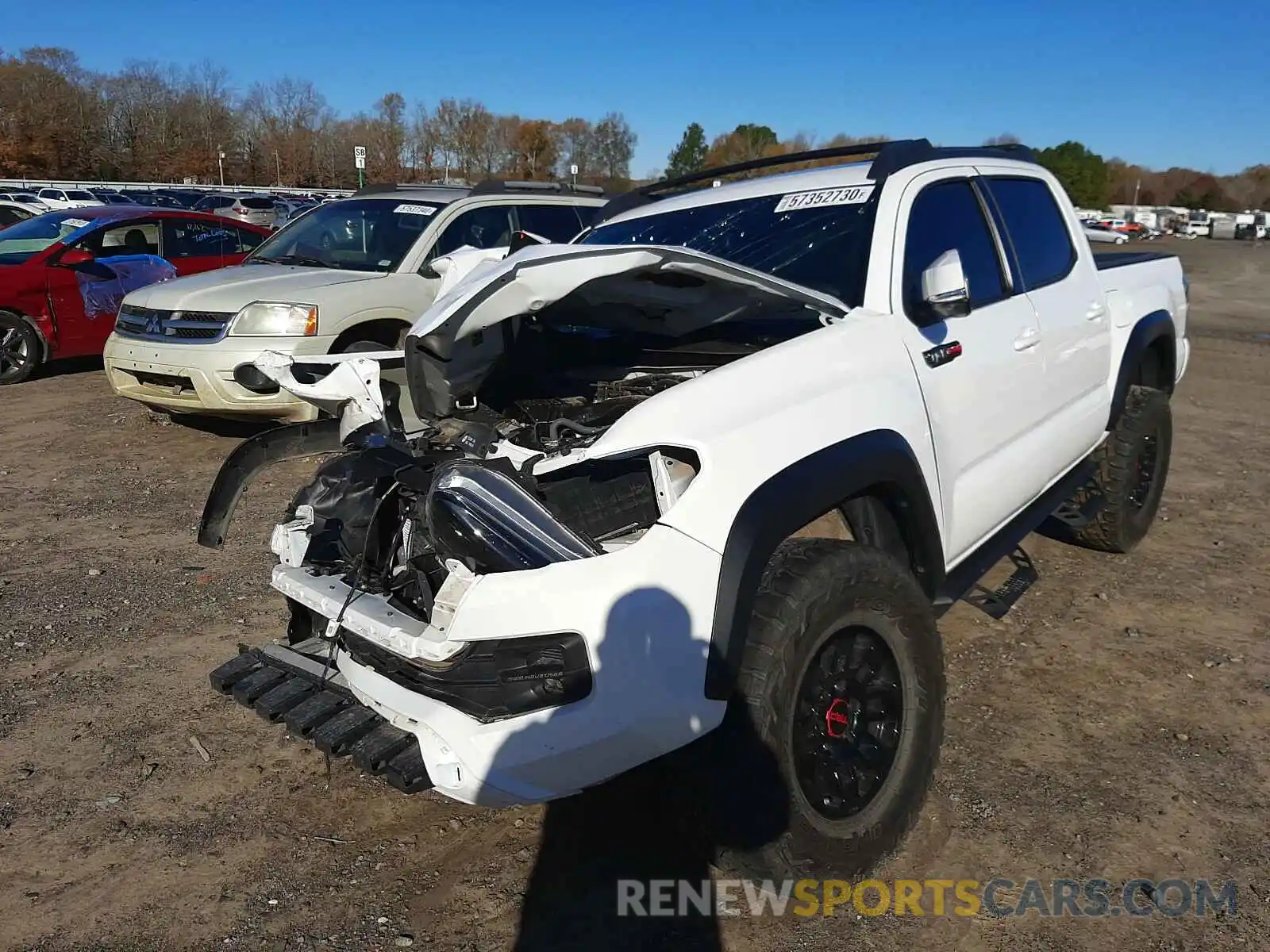 2 Photograph of a damaged car 5TFCZ5AN4KX182905 TOYOTA TACOMA 2019