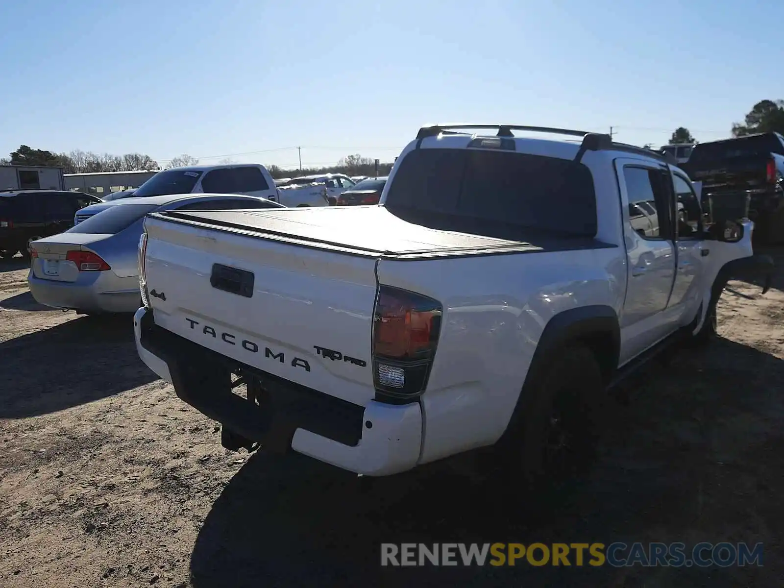 4 Photograph of a damaged car 5TFCZ5AN4KX182905 TOYOTA TACOMA 2019