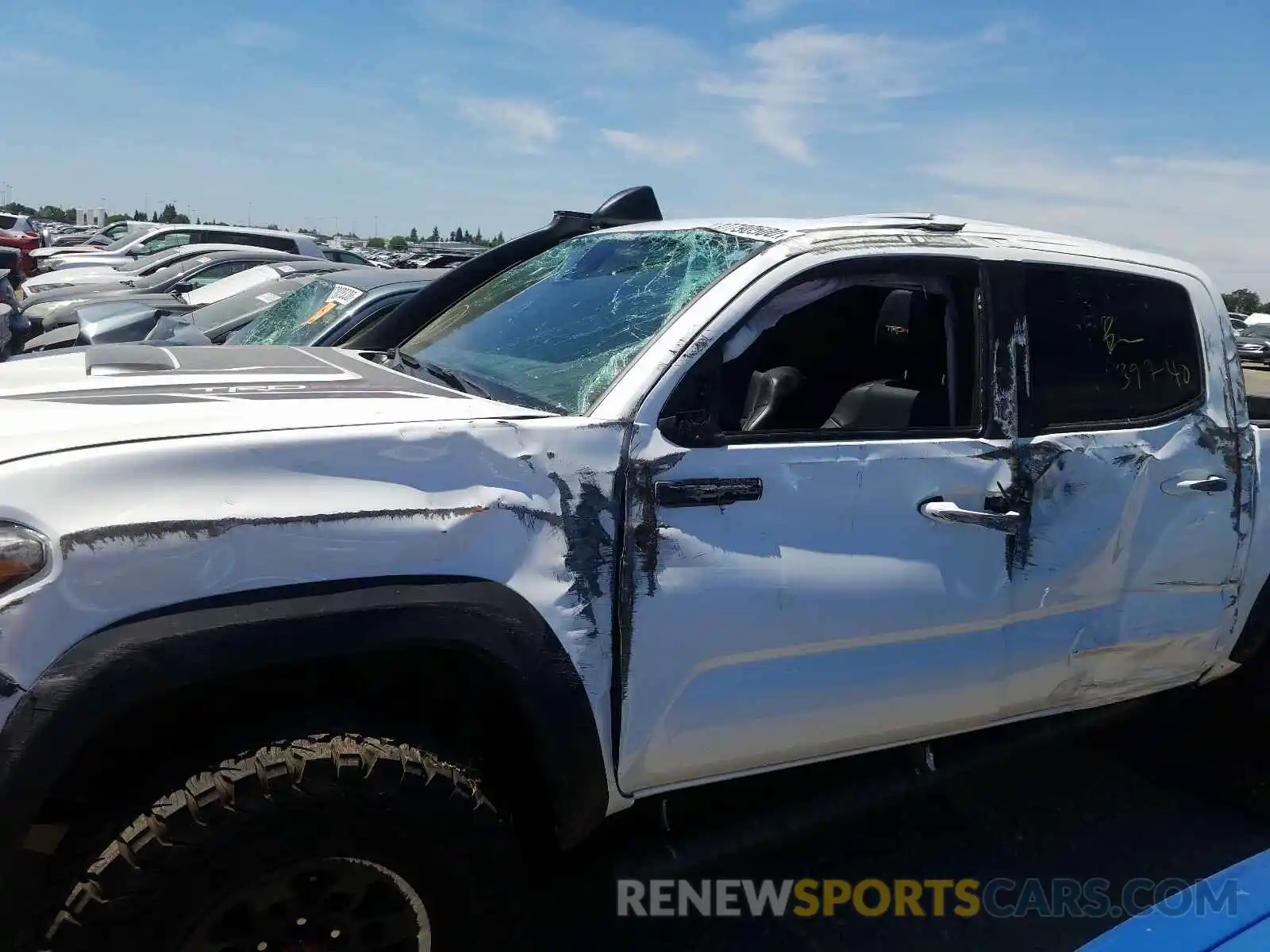 9 Photograph of a damaged car 5TFCZ5AN4KX185982 TOYOTA TACOMA 2019