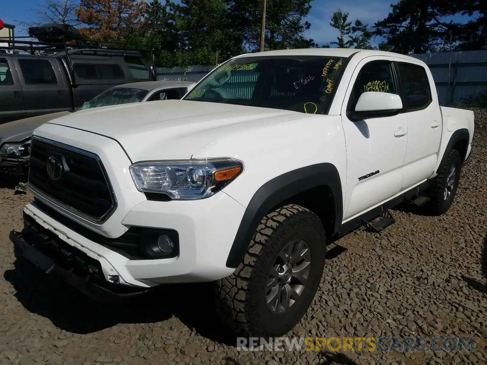 2 Photograph of a damaged car 5TFCZ5AN4KX187960 TOYOTA TACOMA 2019