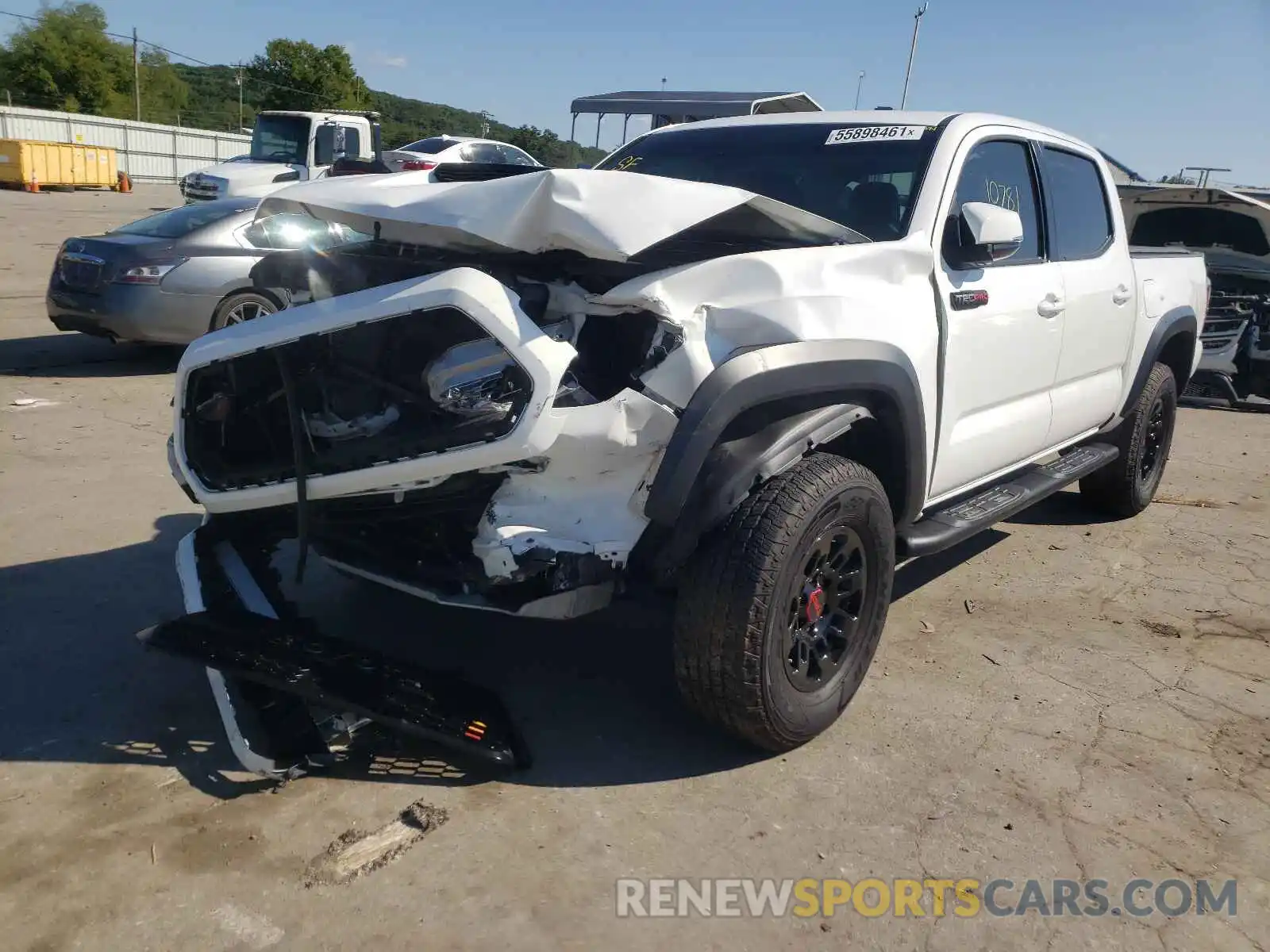 2 Photograph of a damaged car 5TFCZ5AN4KX189207 TOYOTA TACOMA 2019