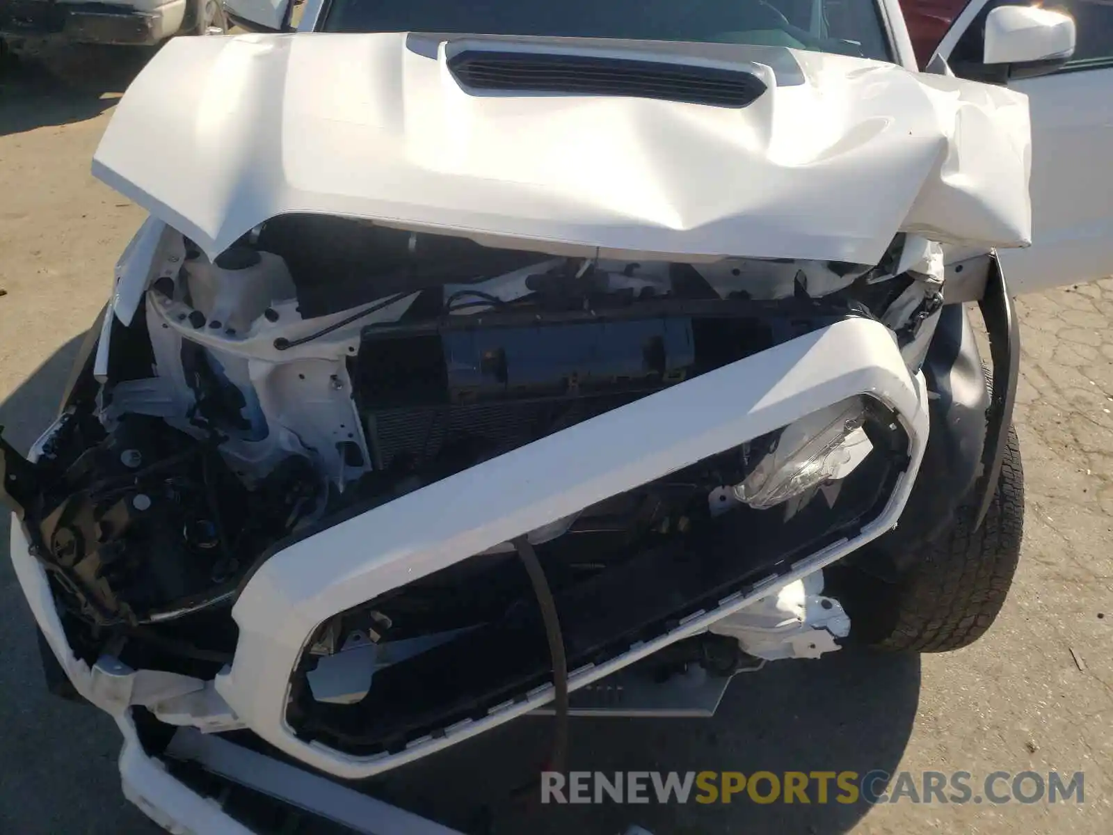 7 Photograph of a damaged car 5TFCZ5AN4KX189207 TOYOTA TACOMA 2019