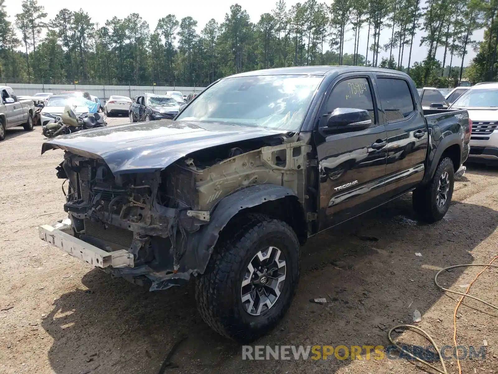 2 Photograph of a damaged car 5TFCZ5AN4KX190695 TOYOTA TACOMA 2019