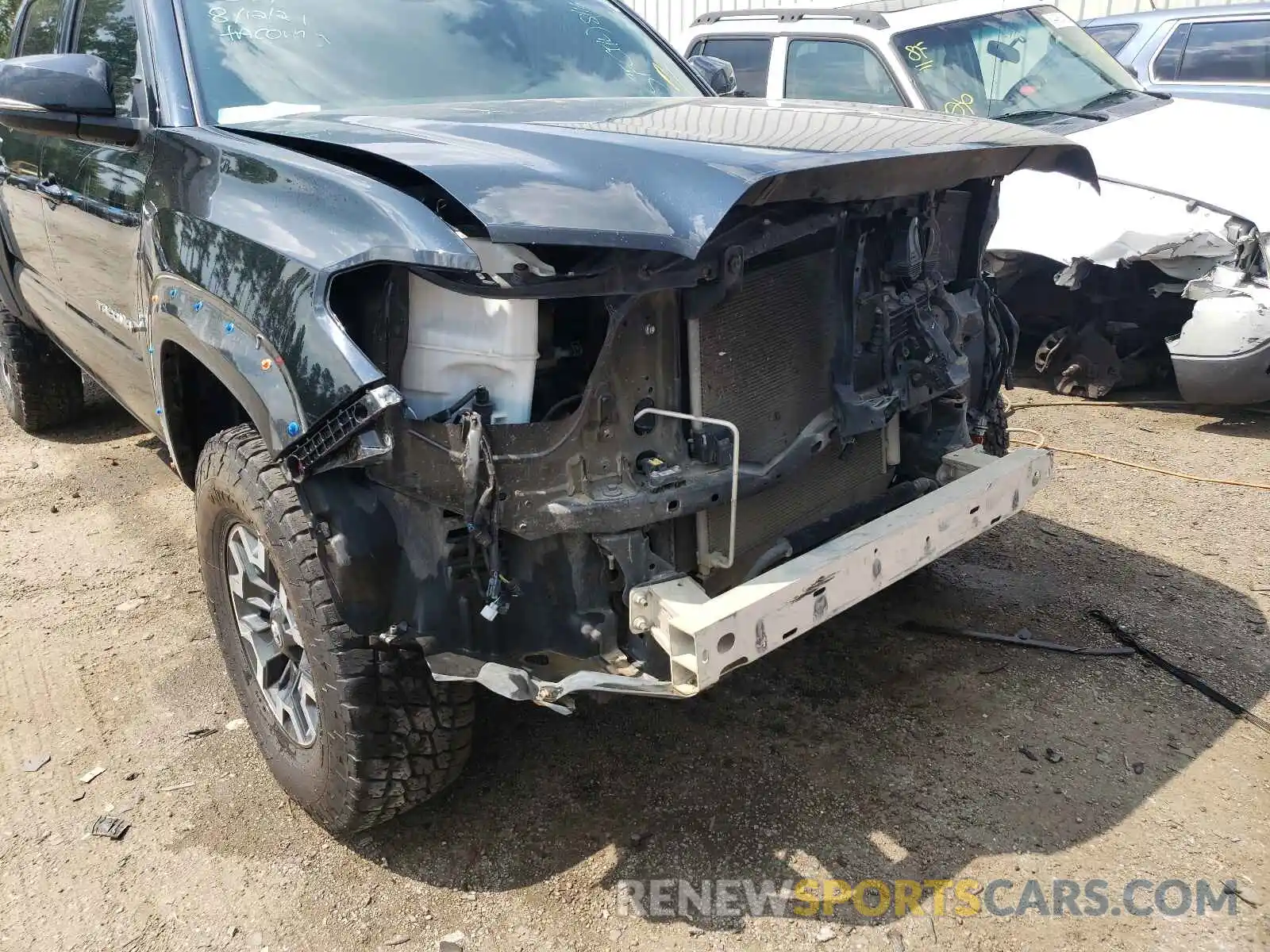 9 Photograph of a damaged car 5TFCZ5AN4KX190695 TOYOTA TACOMA 2019