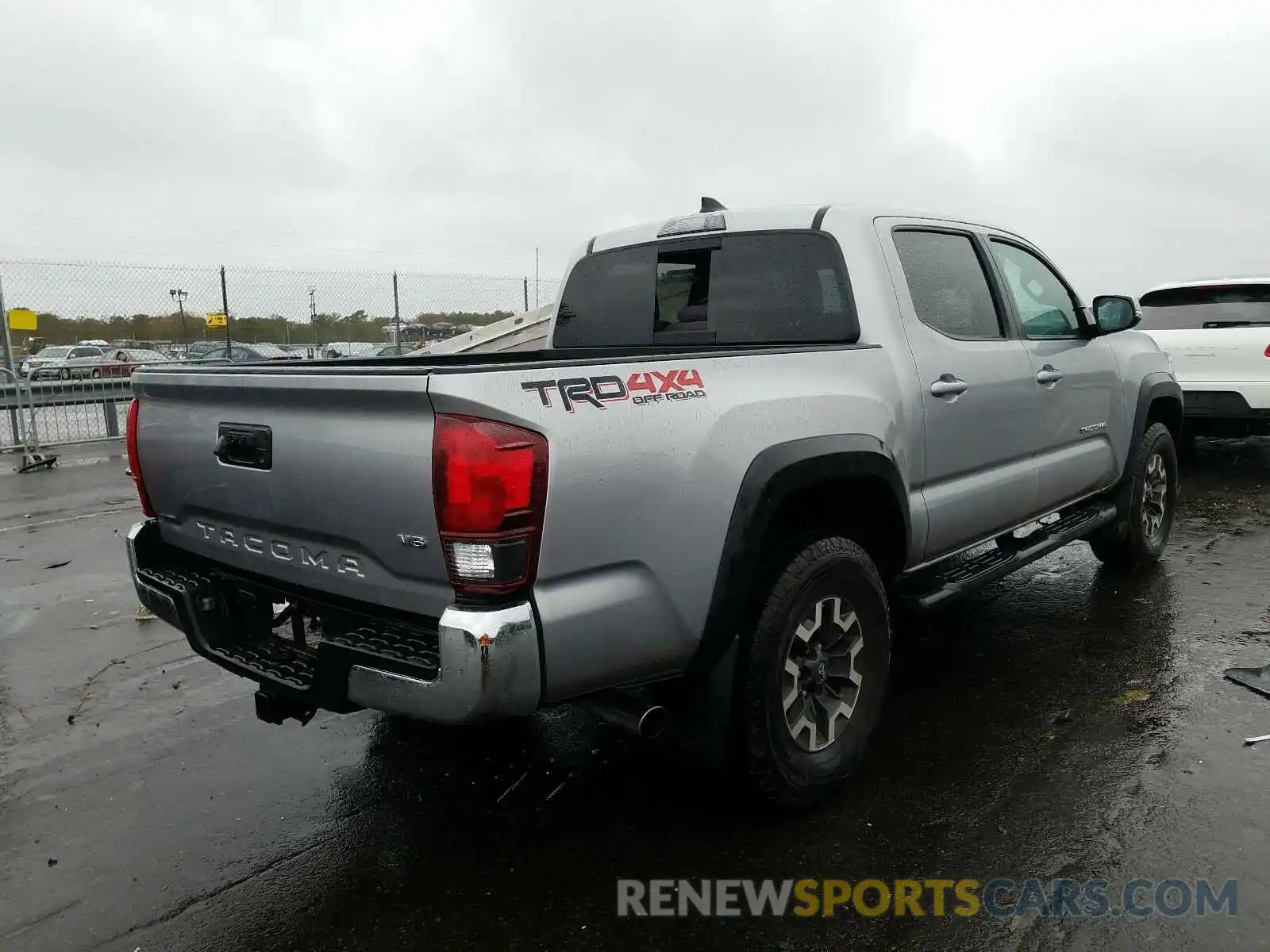 4 Photograph of a damaged car 5TFCZ5AN4KX193810 TOYOTA TACOMA 2019