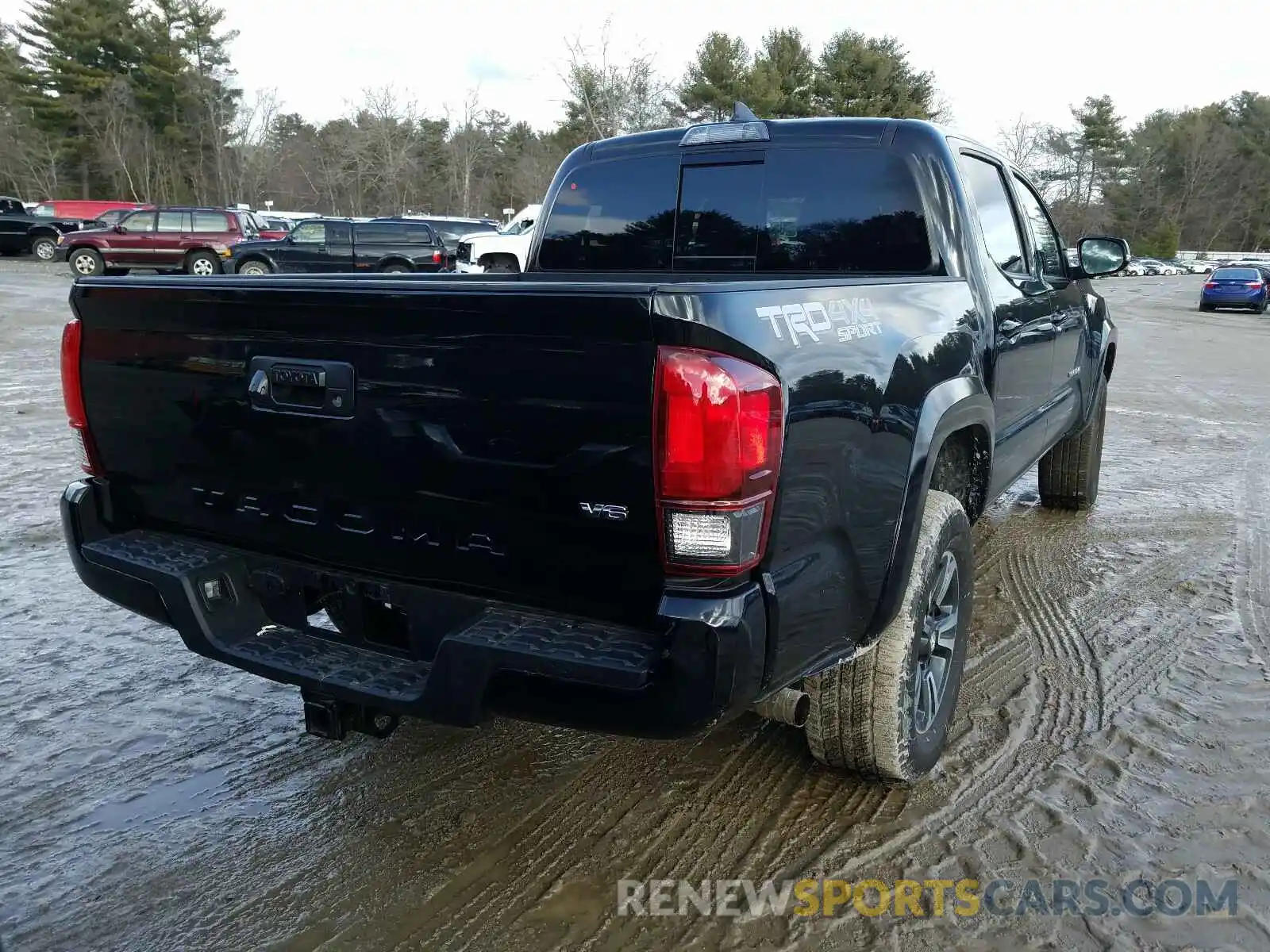 4 Photograph of a damaged car 5TFCZ5AN4KX197212 TOYOTA TACOMA 2019