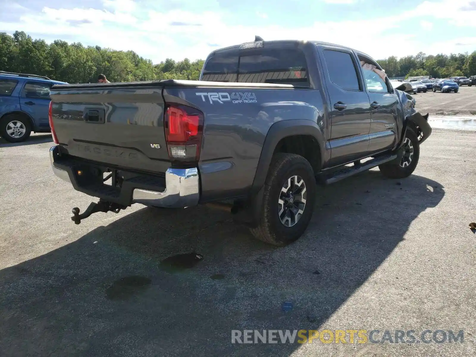 4 Photograph of a damaged car 5TFCZ5AN4KX197565 TOYOTA TACOMA 2019