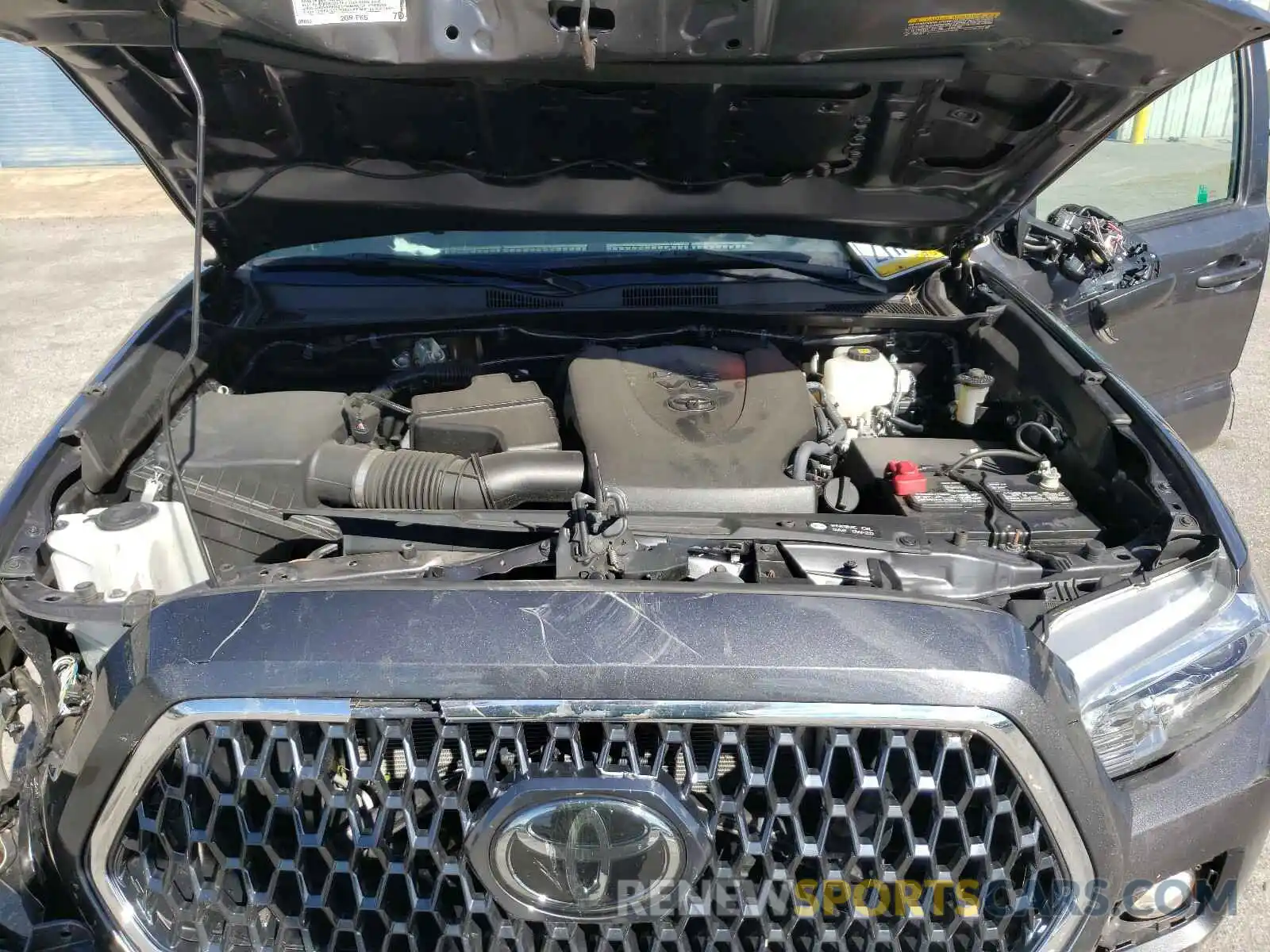 7 Photograph of a damaged car 5TFCZ5AN4KX197565 TOYOTA TACOMA 2019