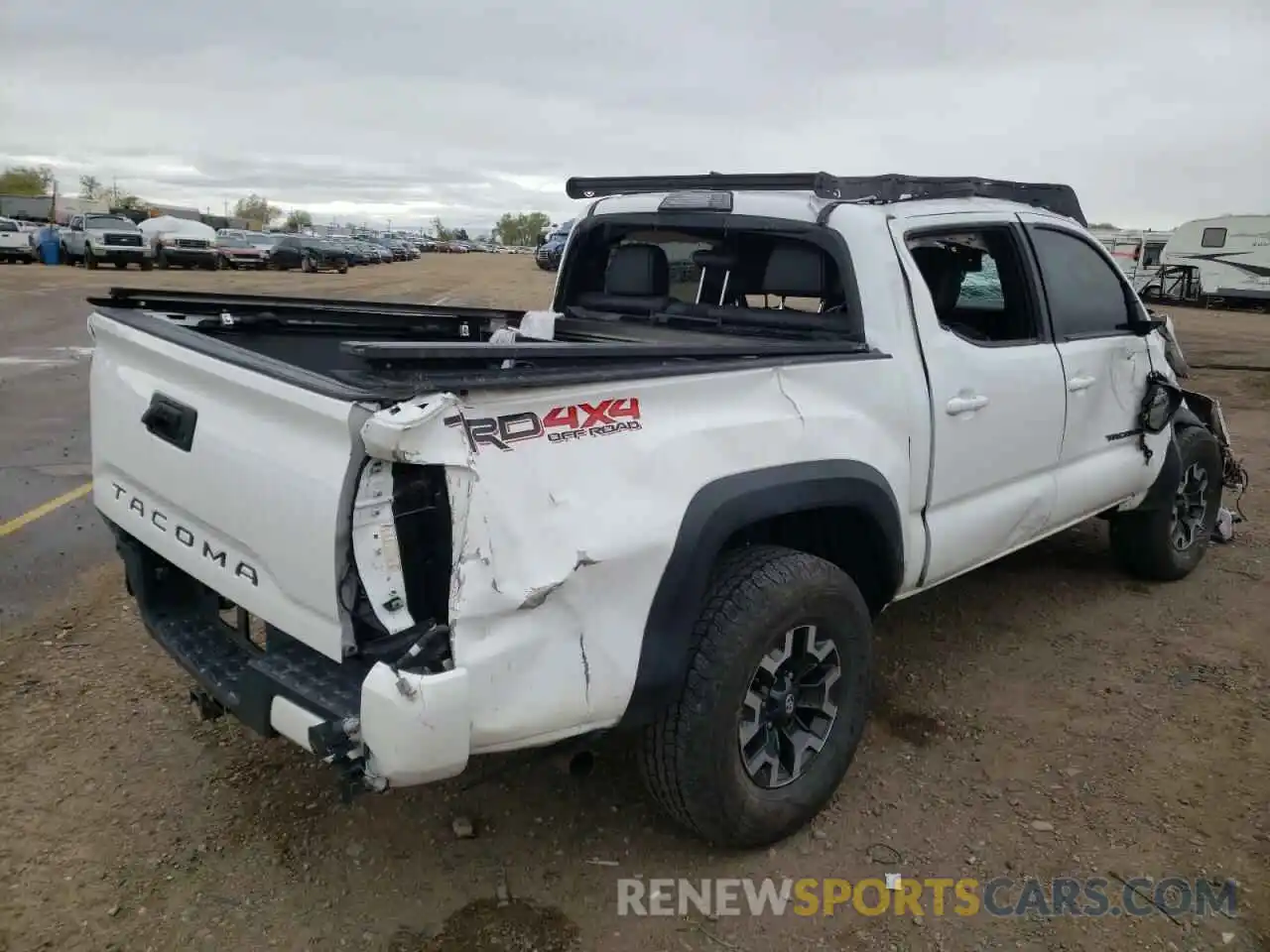 4 Photograph of a damaged car 5TFCZ5AN4KX201114 TOYOTA TACOMA 2019