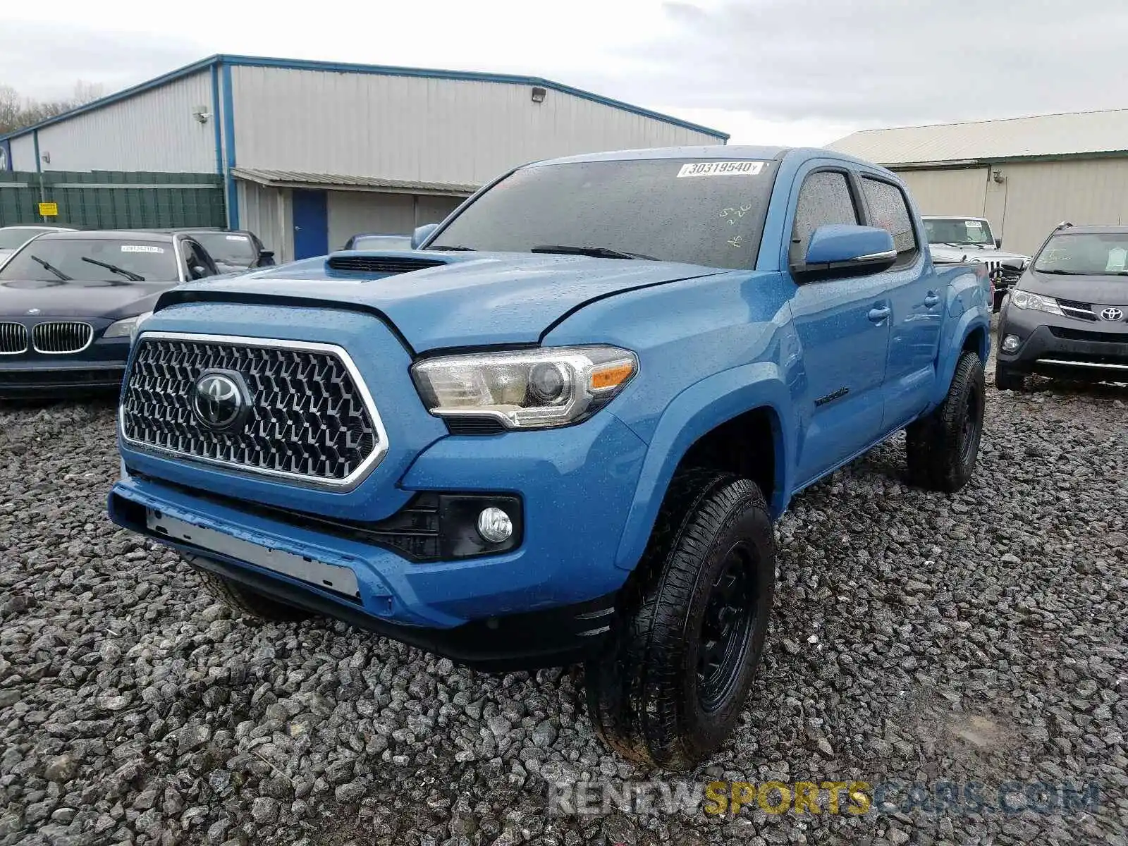 2 Photograph of a damaged car 5TFCZ5AN4KX203025 TOYOTA TACOMA 2019