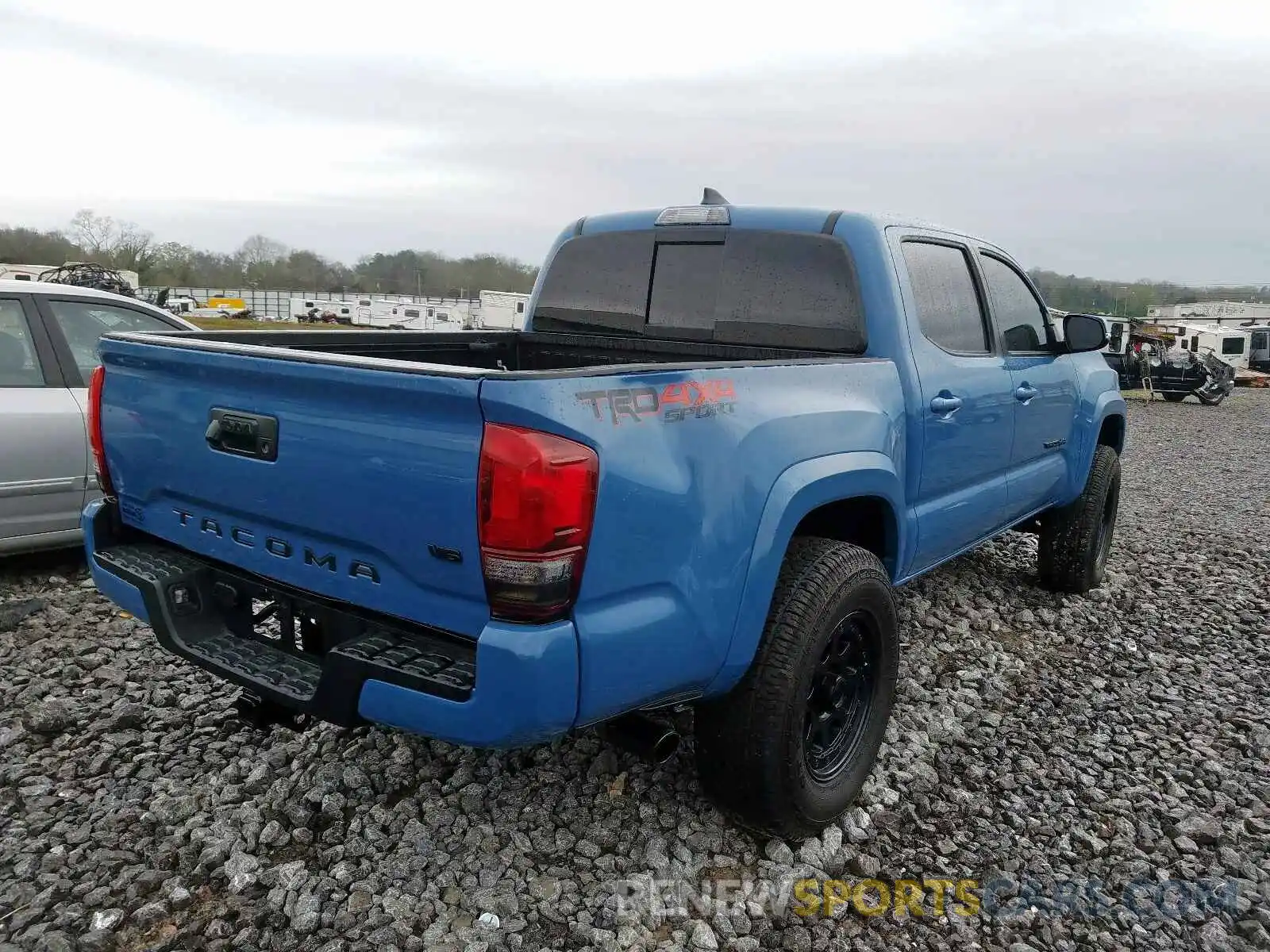 4 Photograph of a damaged car 5TFCZ5AN4KX203025 TOYOTA TACOMA 2019