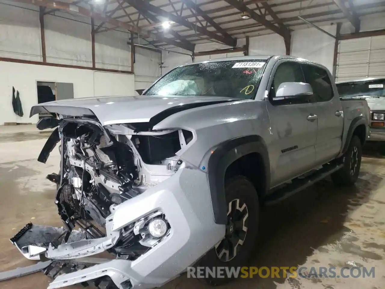 2 Photograph of a damaged car 5TFCZ5AN4KX209617 TOYOTA TACOMA 2019