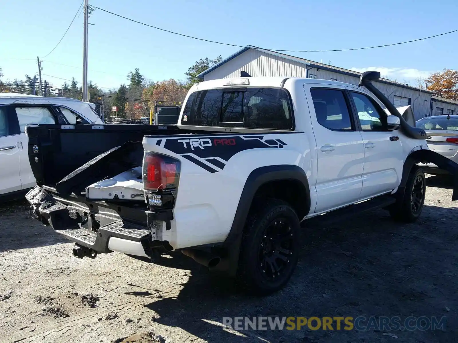 4 Photograph of a damaged car 5TFCZ5AN5KX170035 TOYOTA TACOMA 2019