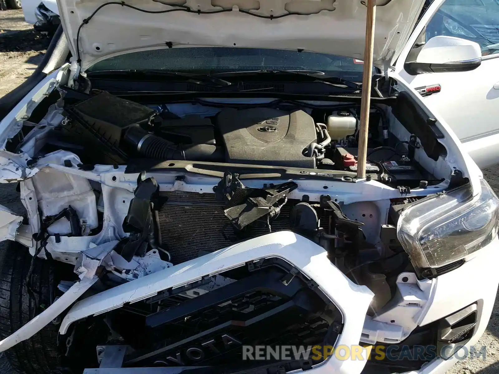 7 Photograph of a damaged car 5TFCZ5AN5KX170035 TOYOTA TACOMA 2019