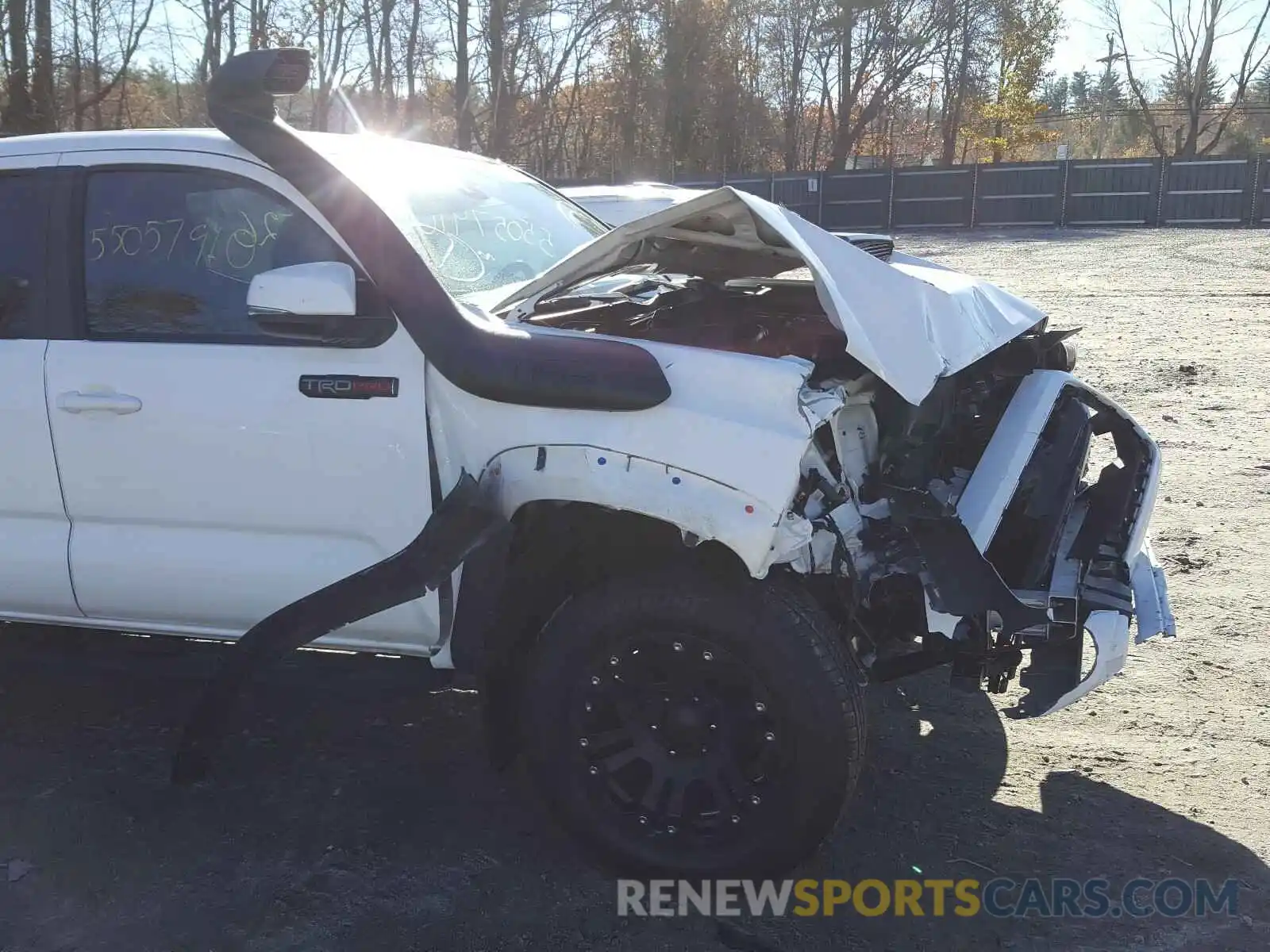 9 Photograph of a damaged car 5TFCZ5AN5KX170035 TOYOTA TACOMA 2019