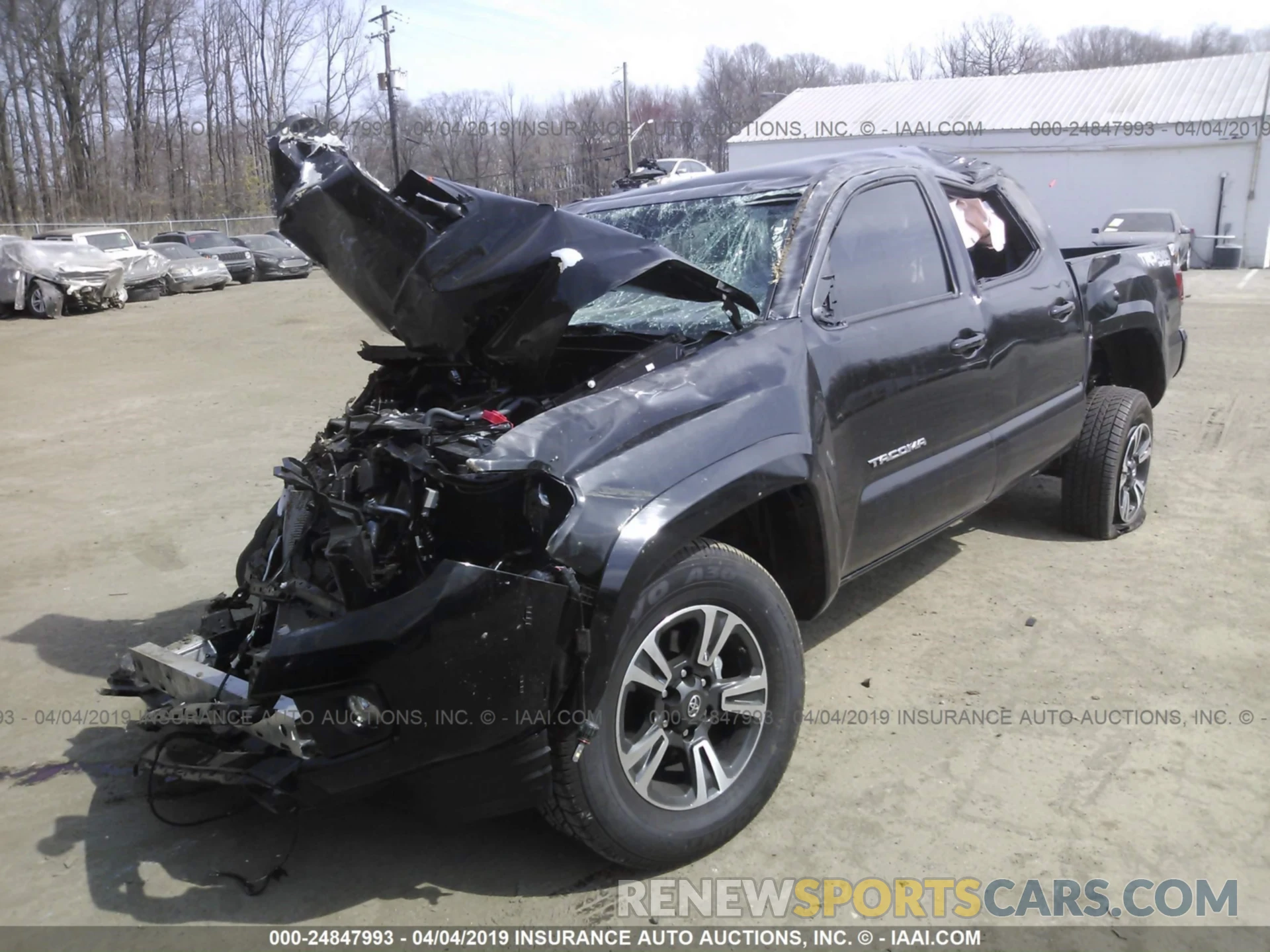 2 Photograph of a damaged car 5TFCZ5AN5KX173971 TOYOTA TACOMA 2019