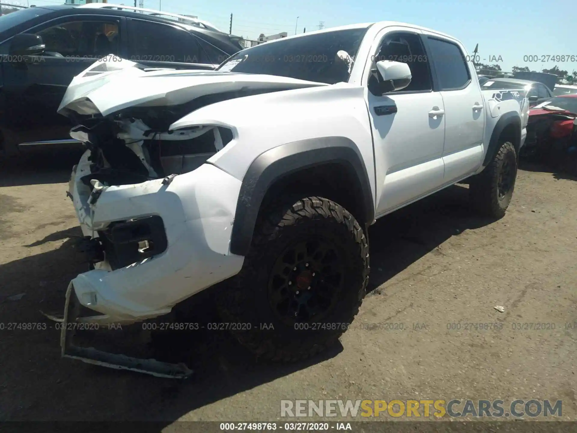 2 Photograph of a damaged car 5TFCZ5AN5KX174568 TOYOTA TACOMA 2019