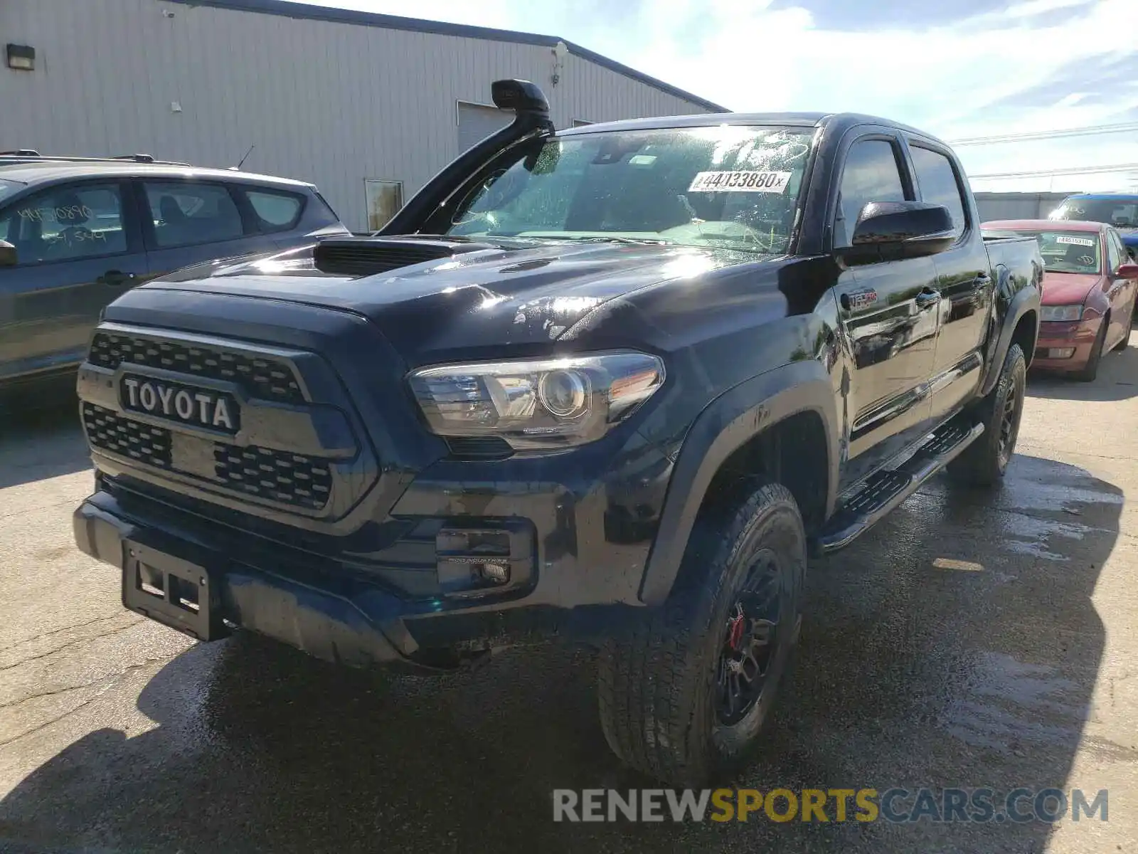 2 Photograph of a damaged car 5TFCZ5AN5KX177602 TOYOTA TACOMA 2019