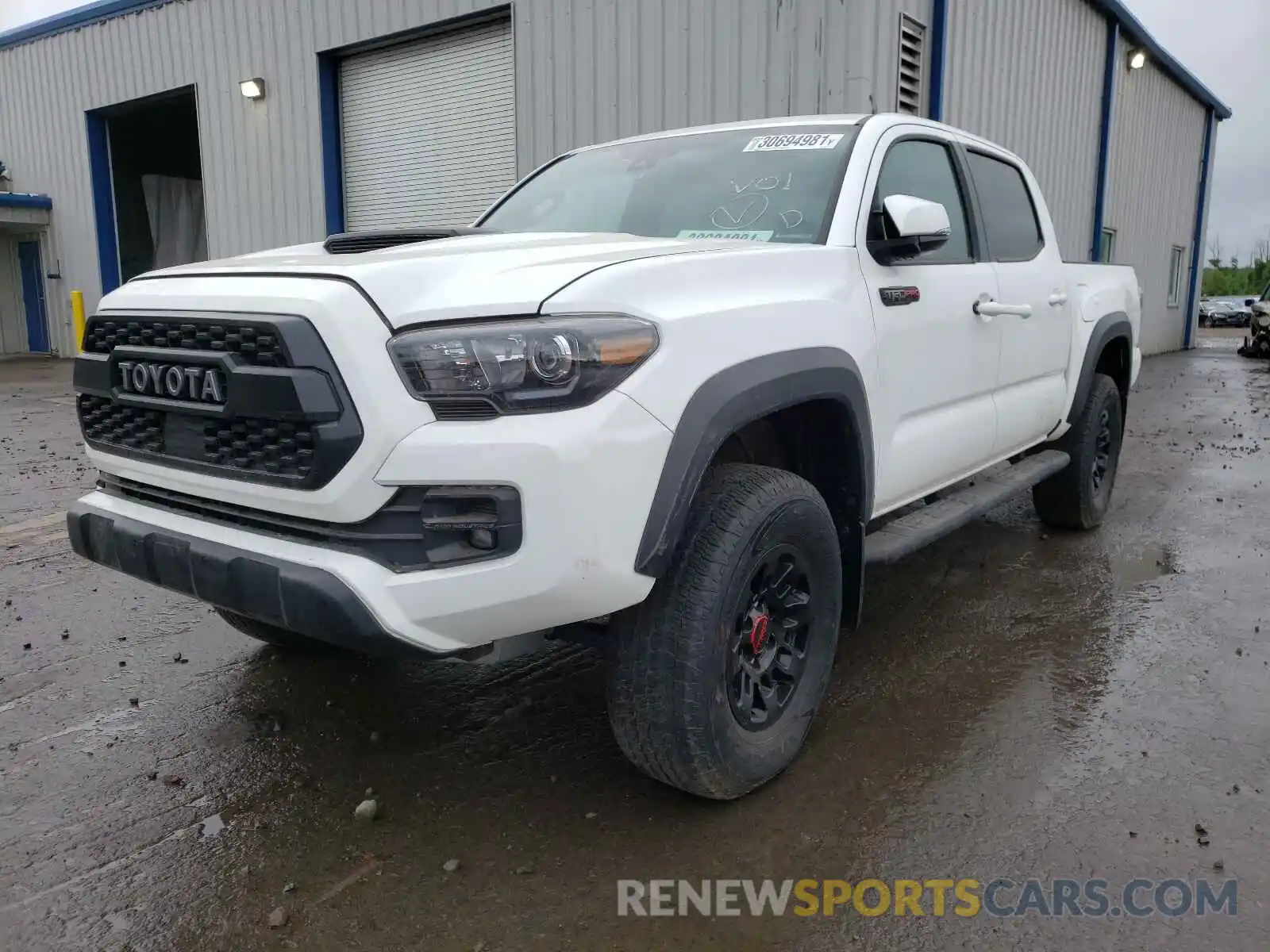 2 Photograph of a damaged car 5TFCZ5AN5KX179012 TOYOTA TACOMA 2019