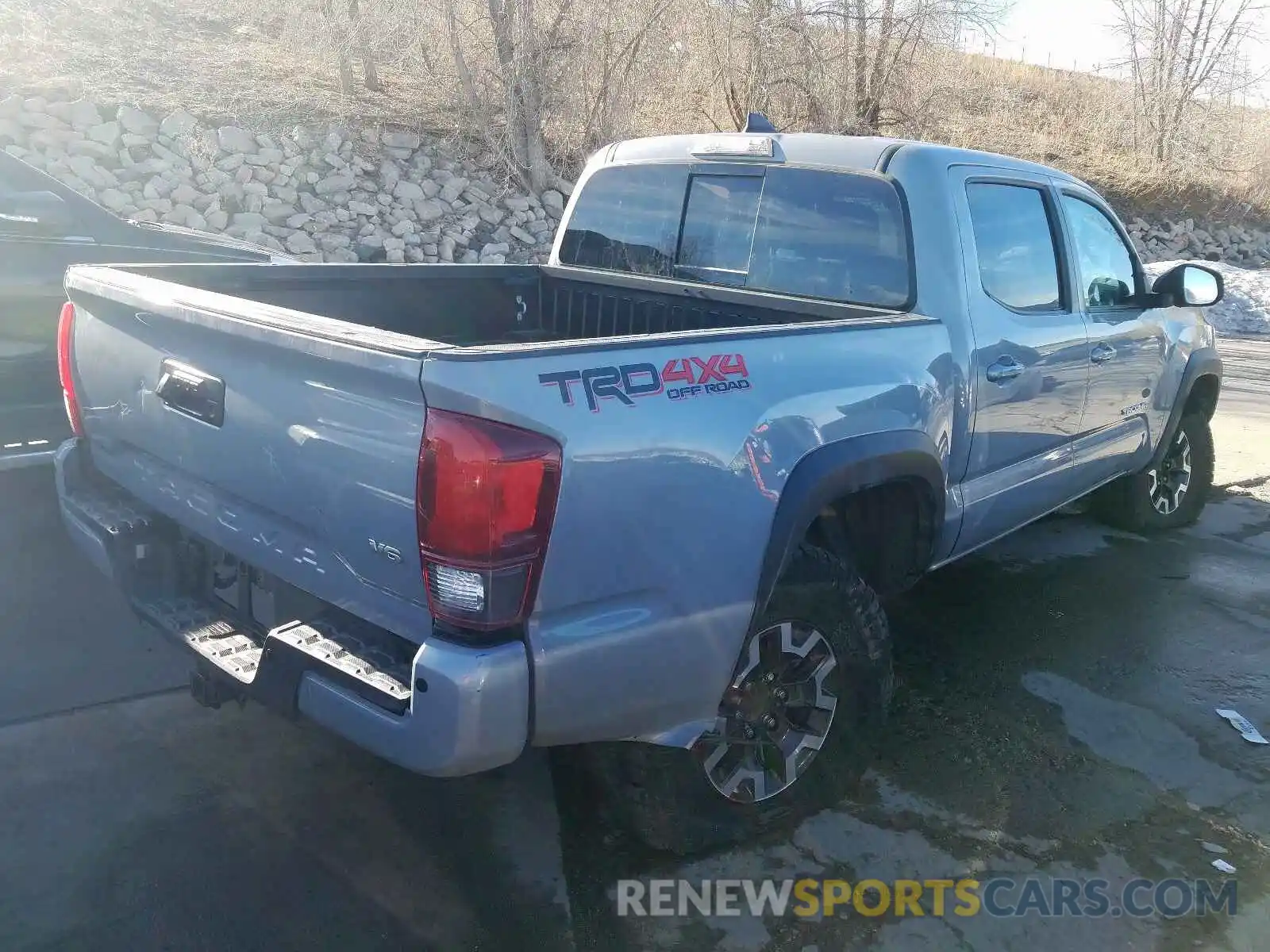 4 Photograph of a damaged car 5TFCZ5AN5KX182265 TOYOTA TACOMA 2019