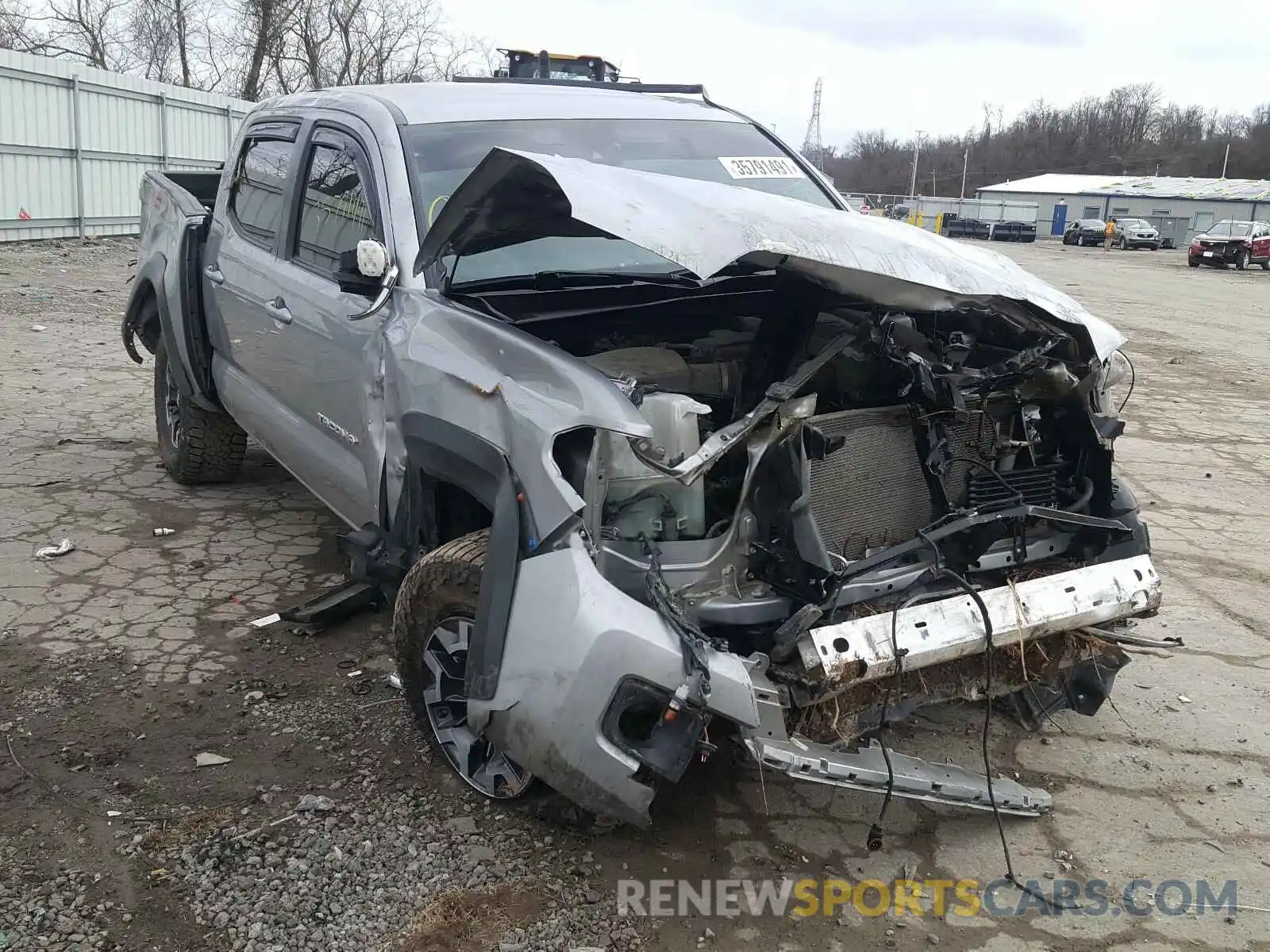 1 Photograph of a damaged car 5TFCZ5AN5KX182430 TOYOTA TACOMA 2019