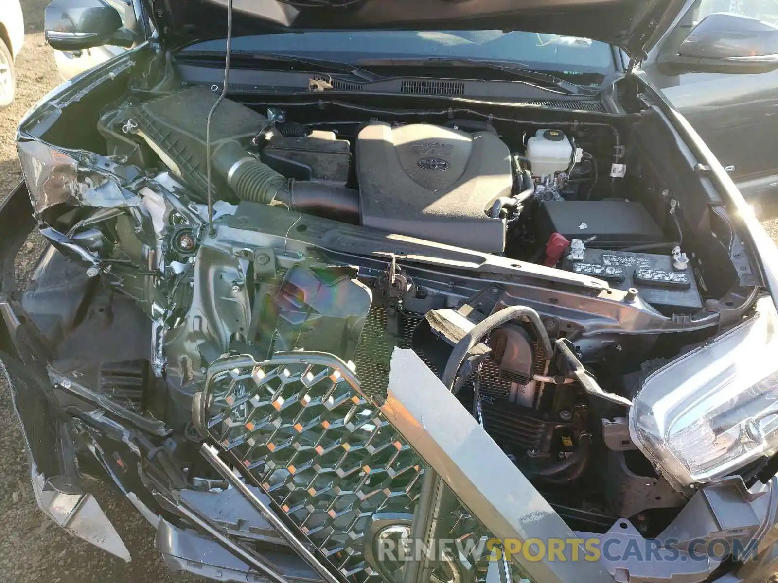 7 Photograph of a damaged car 5TFCZ5AN5KX187367 TOYOTA TACOMA 2019