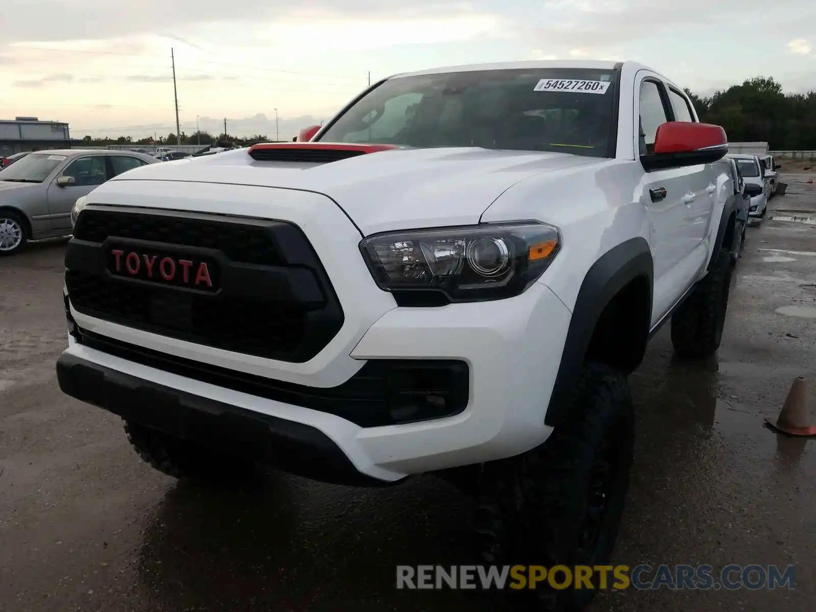 2 Photograph of a damaged car 5TFCZ5AN5KX188647 TOYOTA TACOMA 2019