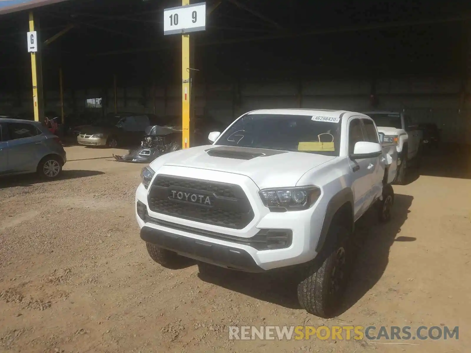 2 Photograph of a damaged car 5TFCZ5AN5KX191077 TOYOTA TACOMA 2019