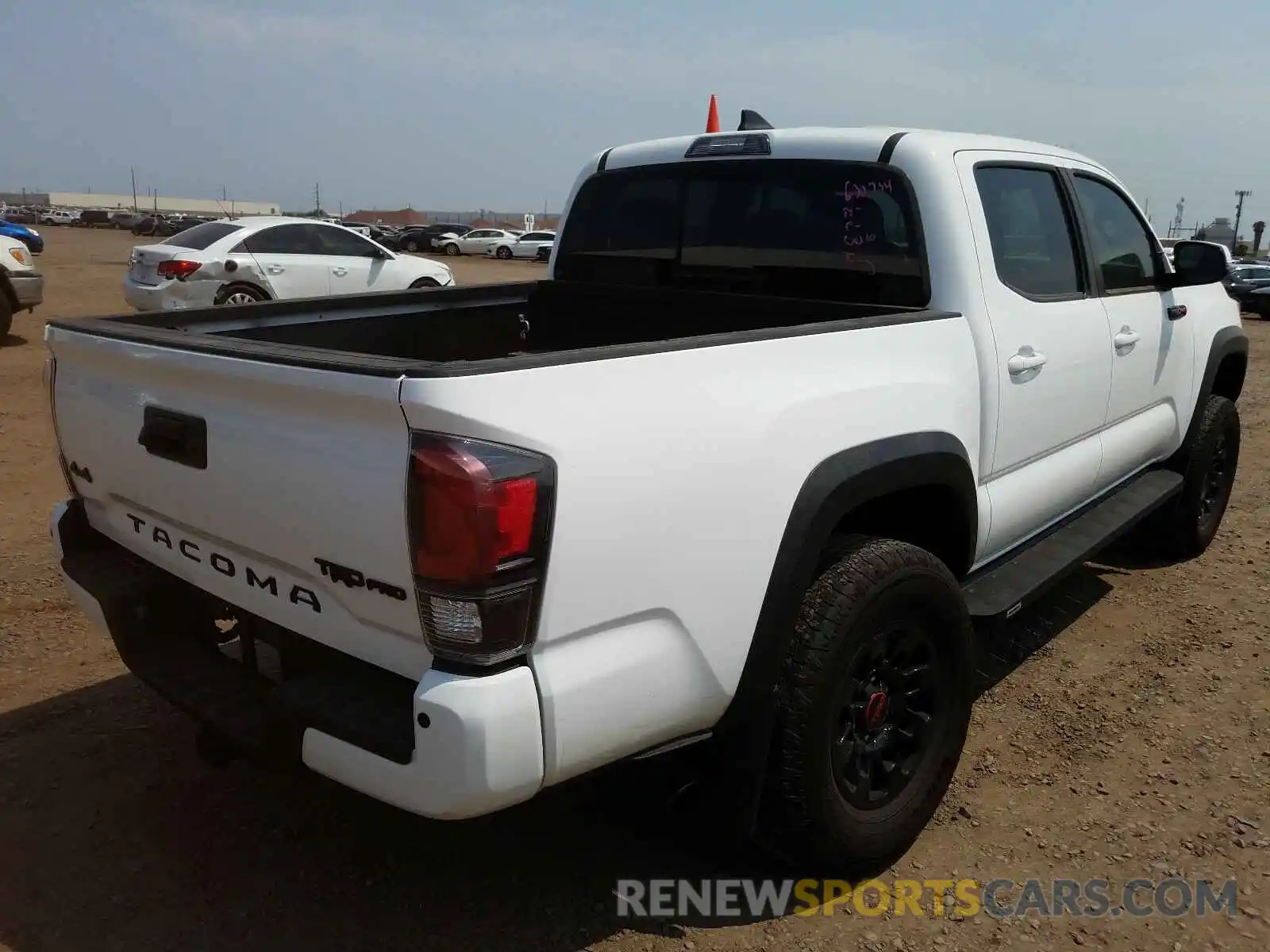 4 Photograph of a damaged car 5TFCZ5AN5KX191077 TOYOTA TACOMA 2019