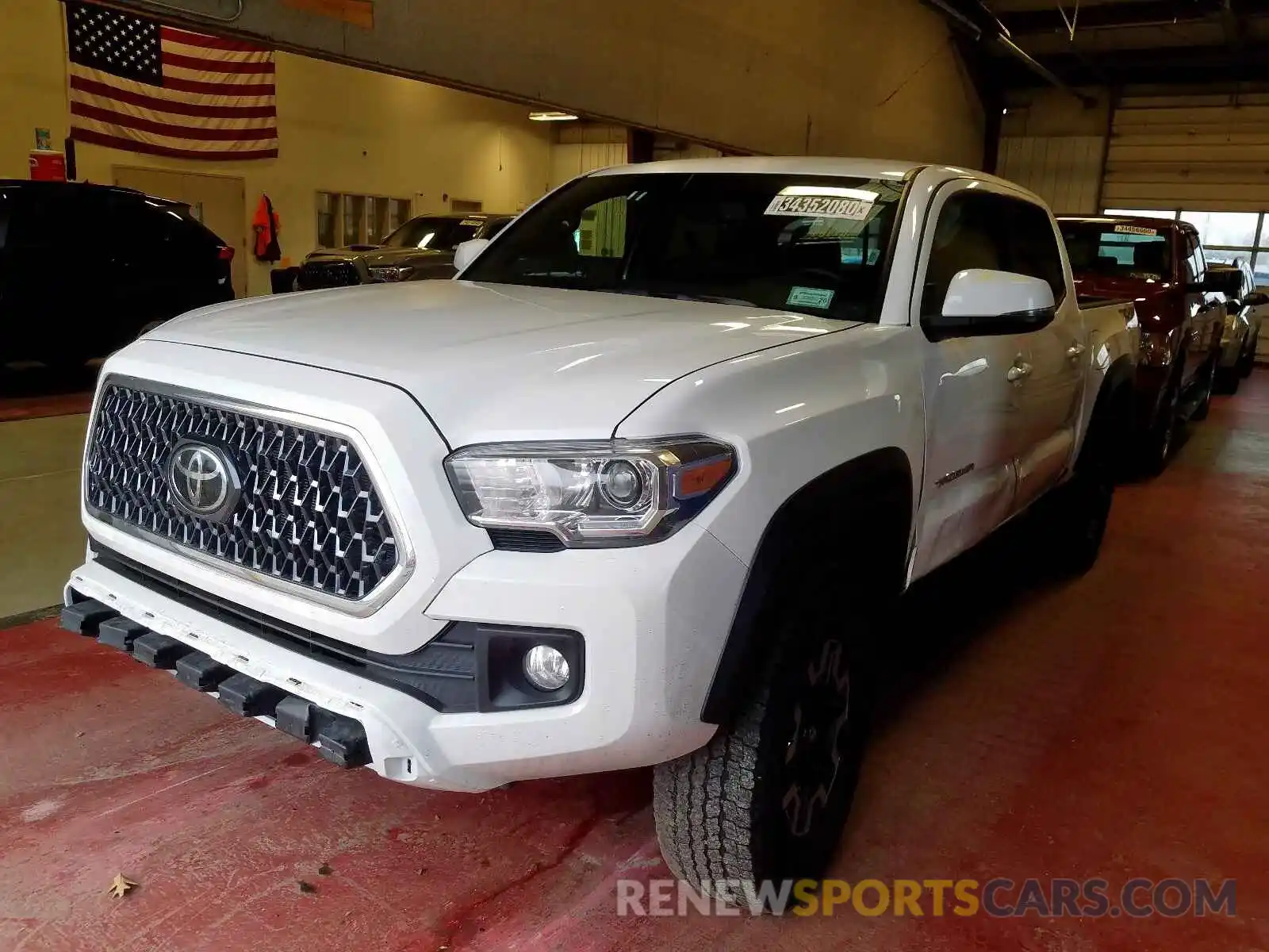 2 Photograph of a damaged car 5TFCZ5AN5KX191516 TOYOTA TACOMA 2019