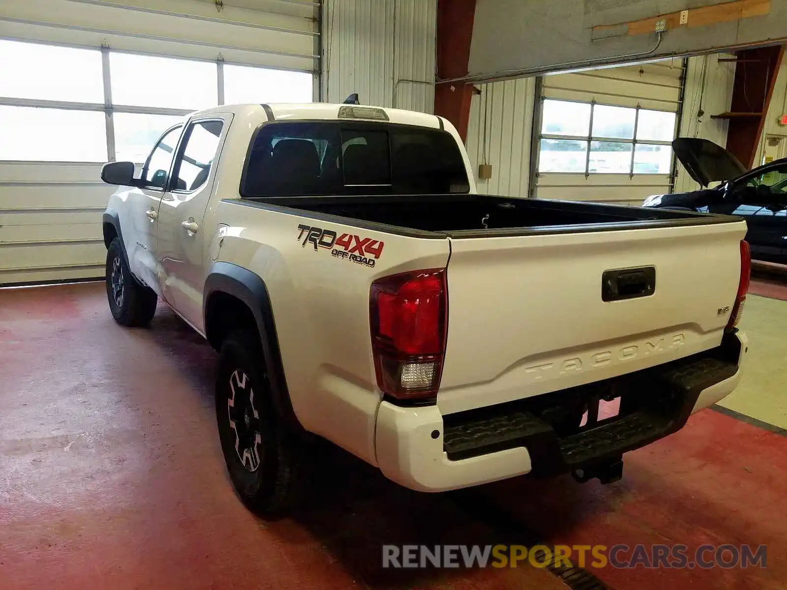 3 Photograph of a damaged car 5TFCZ5AN5KX191516 TOYOTA TACOMA 2019