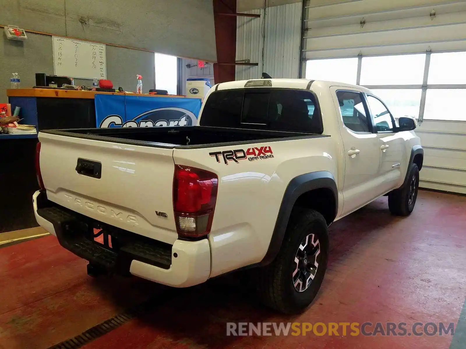 4 Photograph of a damaged car 5TFCZ5AN5KX191516 TOYOTA TACOMA 2019