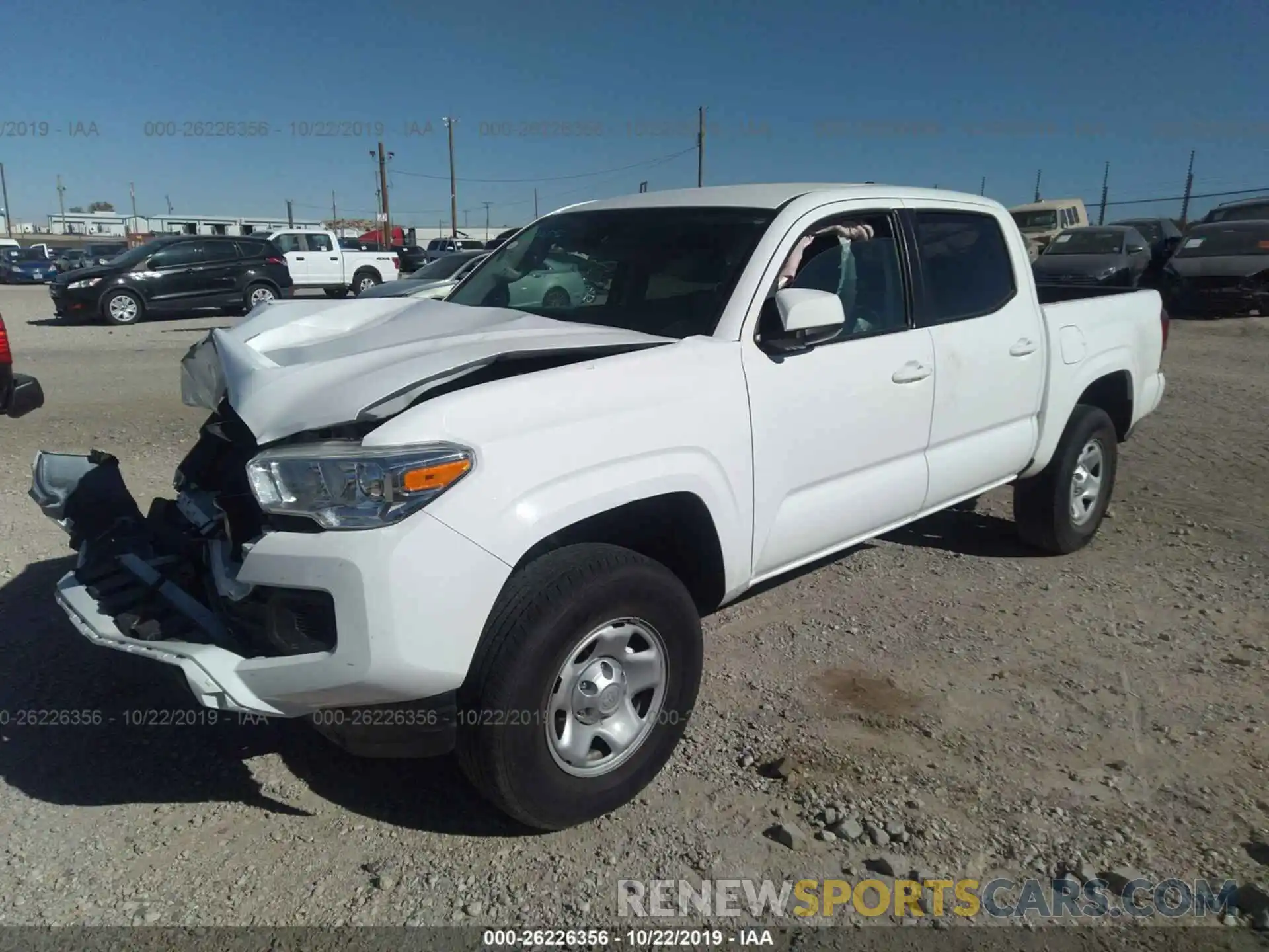 2 Photograph of a damaged car 5TFCZ5AN5KX194609 TOYOTA TACOMA 2019