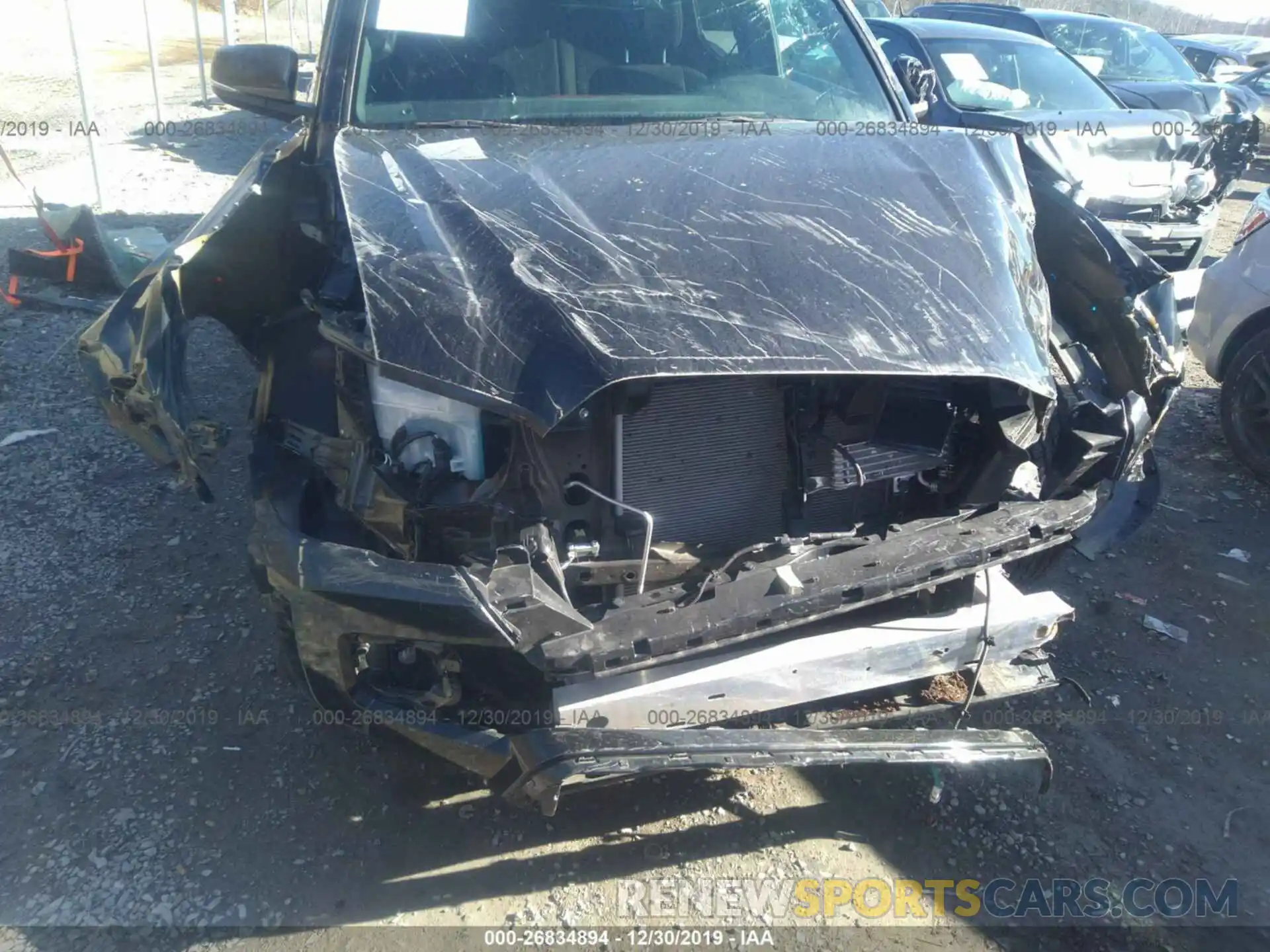 6 Photograph of a damaged car 5TFCZ5AN5KX195033 TOYOTA TACOMA 2019