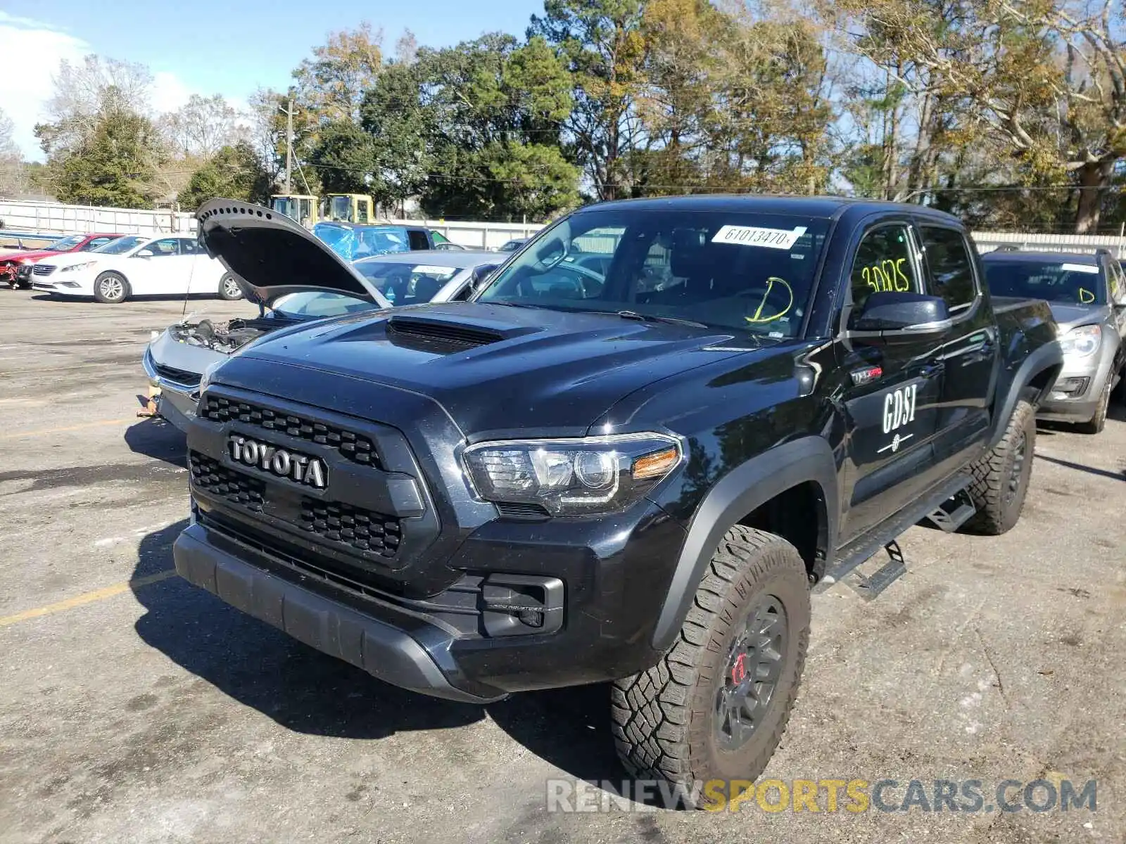 2 Photograph of a damaged car 5TFCZ5AN5KX195792 TOYOTA TACOMA 2019