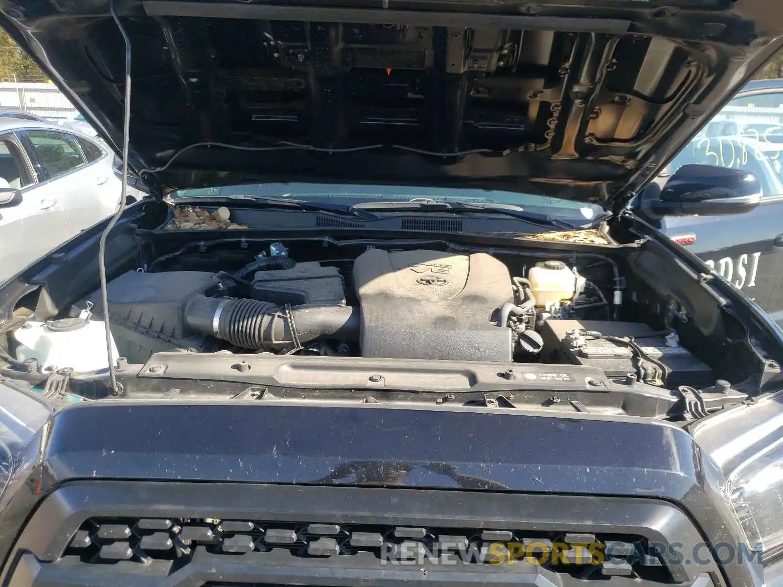 7 Photograph of a damaged car 5TFCZ5AN5KX195792 TOYOTA TACOMA 2019