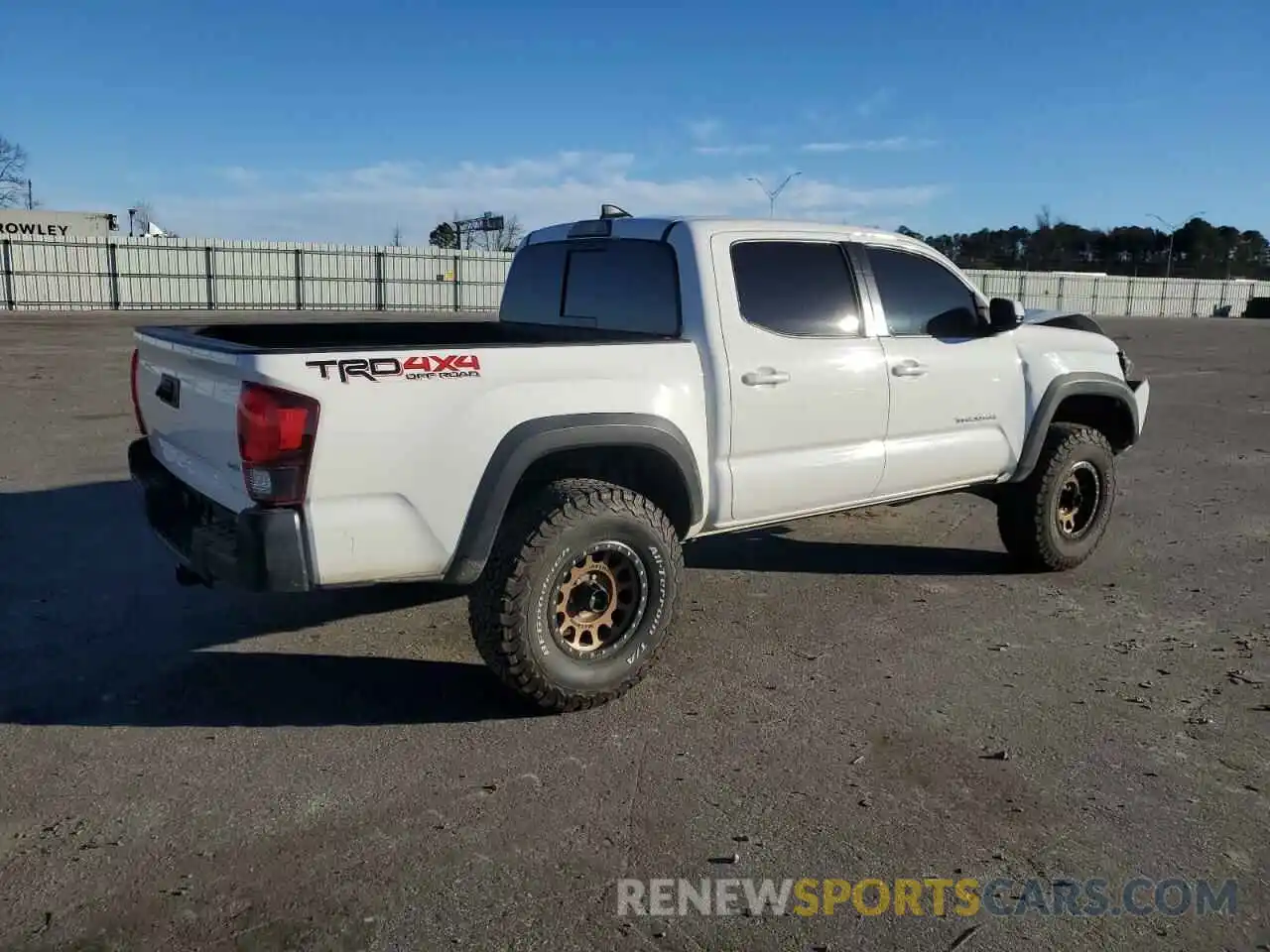 3 Photograph of a damaged car 5TFCZ5AN5KX201543 TOYOTA TACOMA 2019