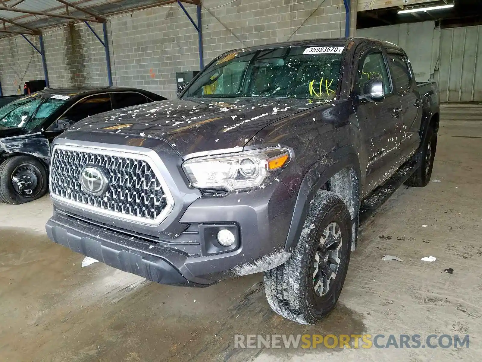 2 Photograph of a damaged car 5TFCZ5AN5KX203261 TOYOTA TACOMA 2019